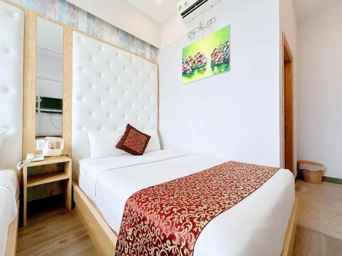 Bed in EMERALD OCEAN HOTEL