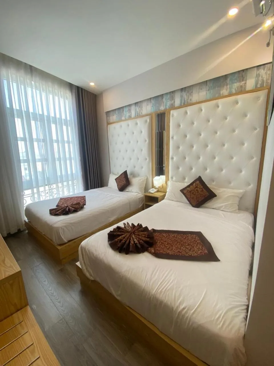 Bed in EMERALD OCEAN HOTEL