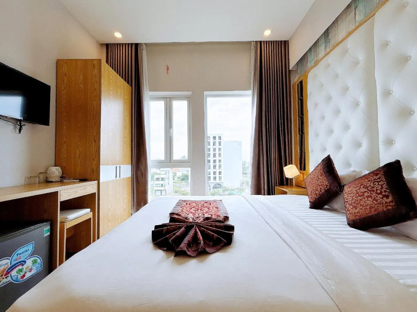 Bed in EMERALD OCEAN HOTEL