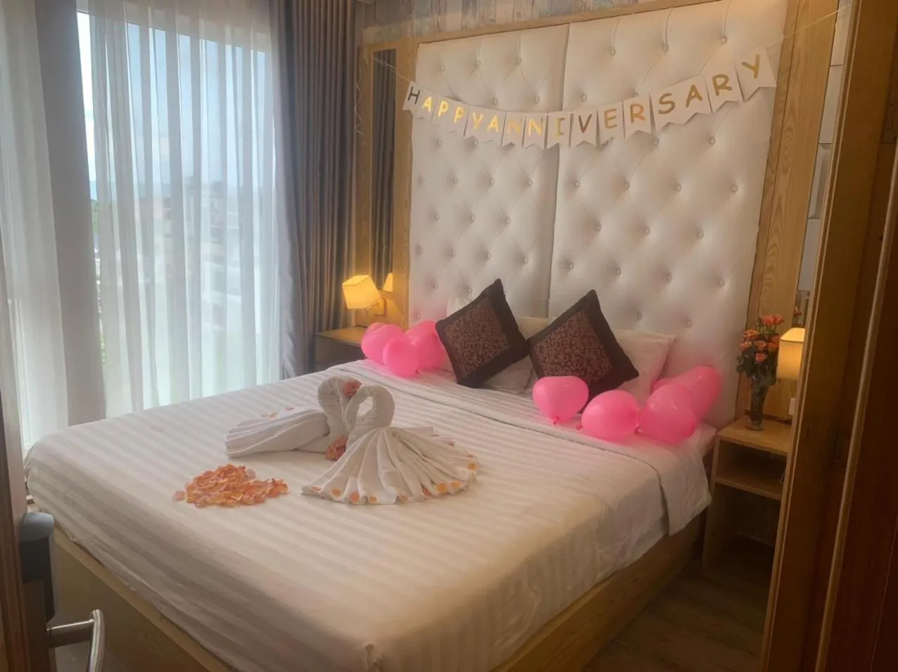 Bed in EMERALD OCEAN HOTEL