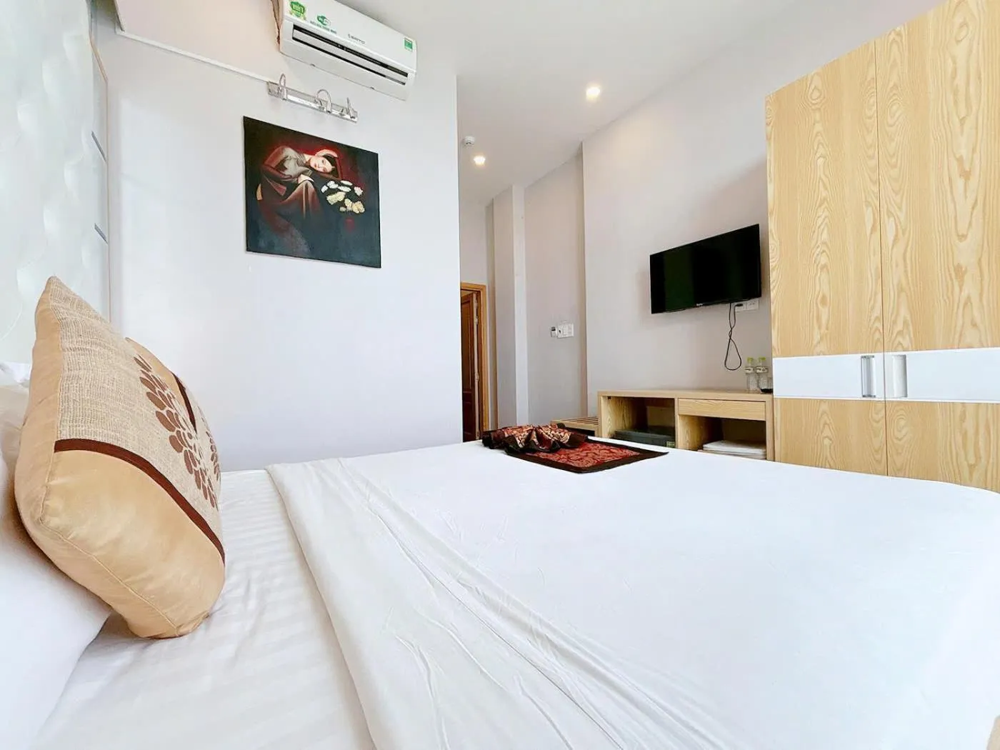 Bed in EMERALD OCEAN HOTEL