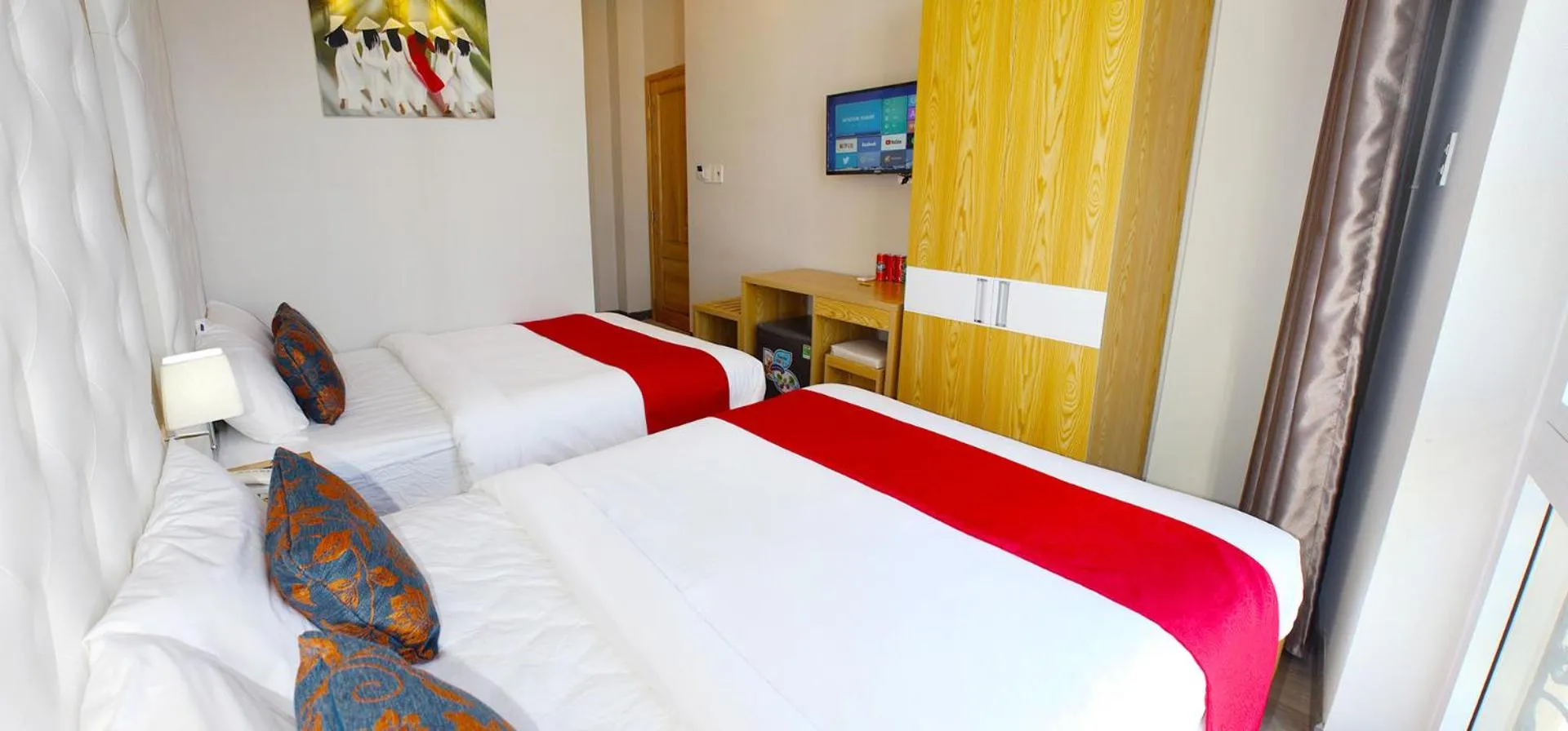 Bed in EMERALD OCEAN HOTEL