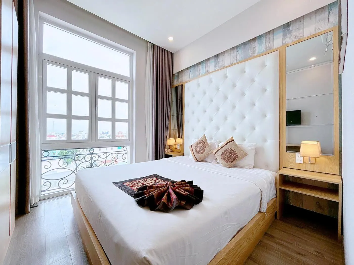 Bed in EMERALD OCEAN HOTEL