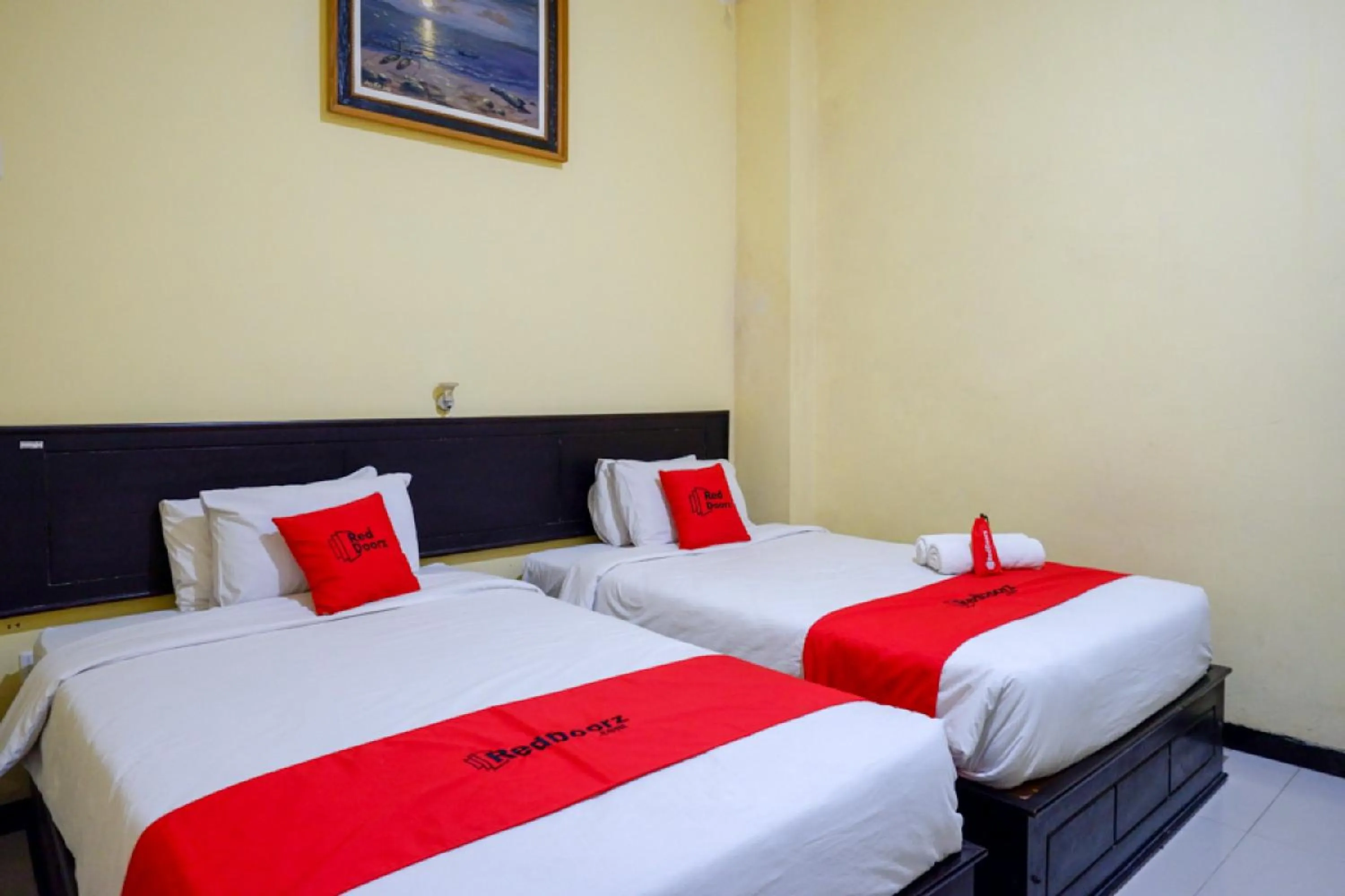 Bed in RedDoorz near Citraland Waterpark Kendari