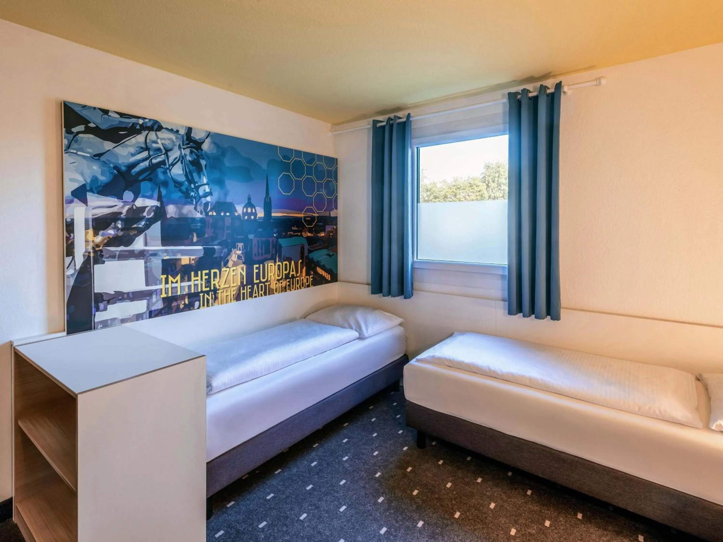 Photo of the whole room, Bed in B&B HOTEL Aachen-Würselen