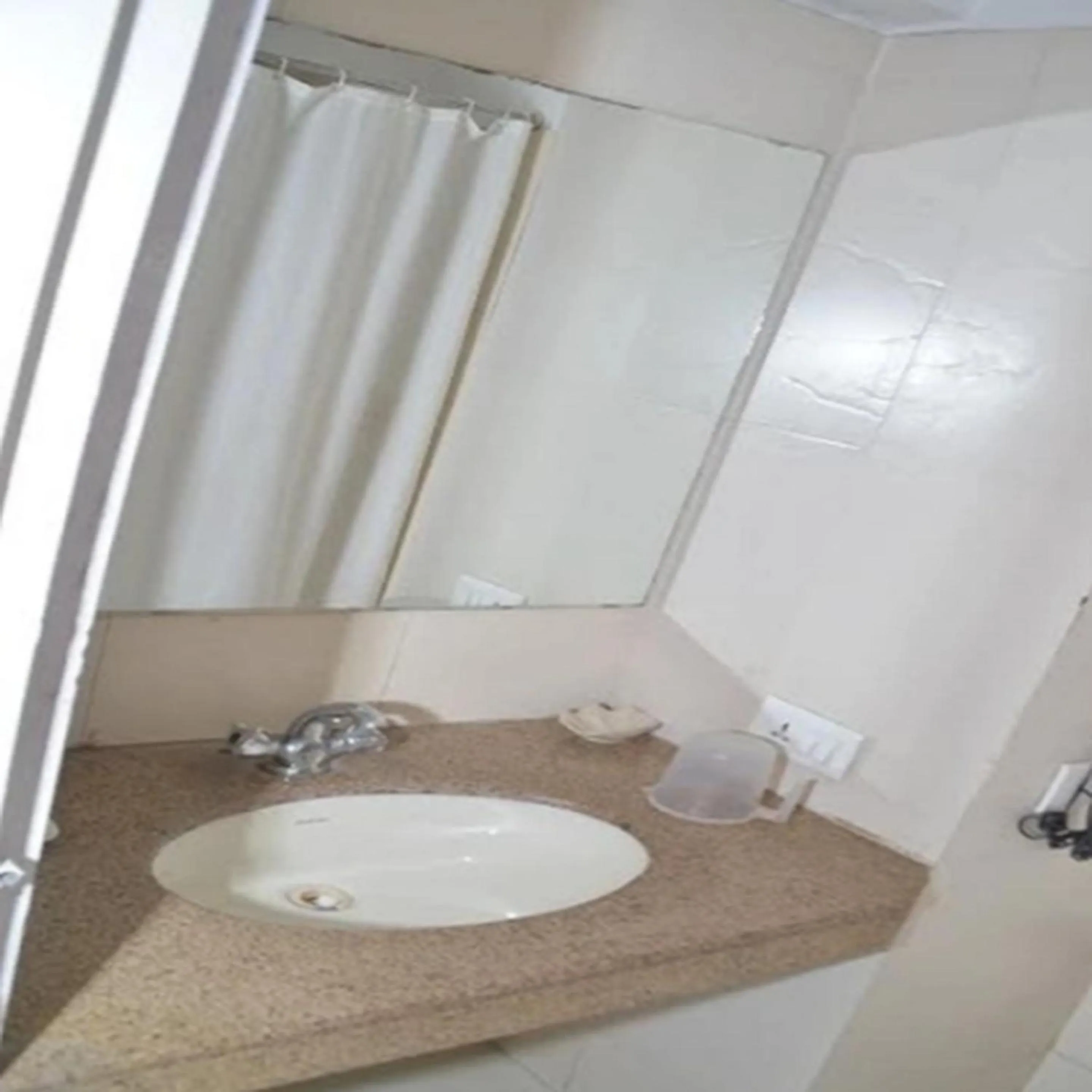 Bathroom in Regency Square Hotel