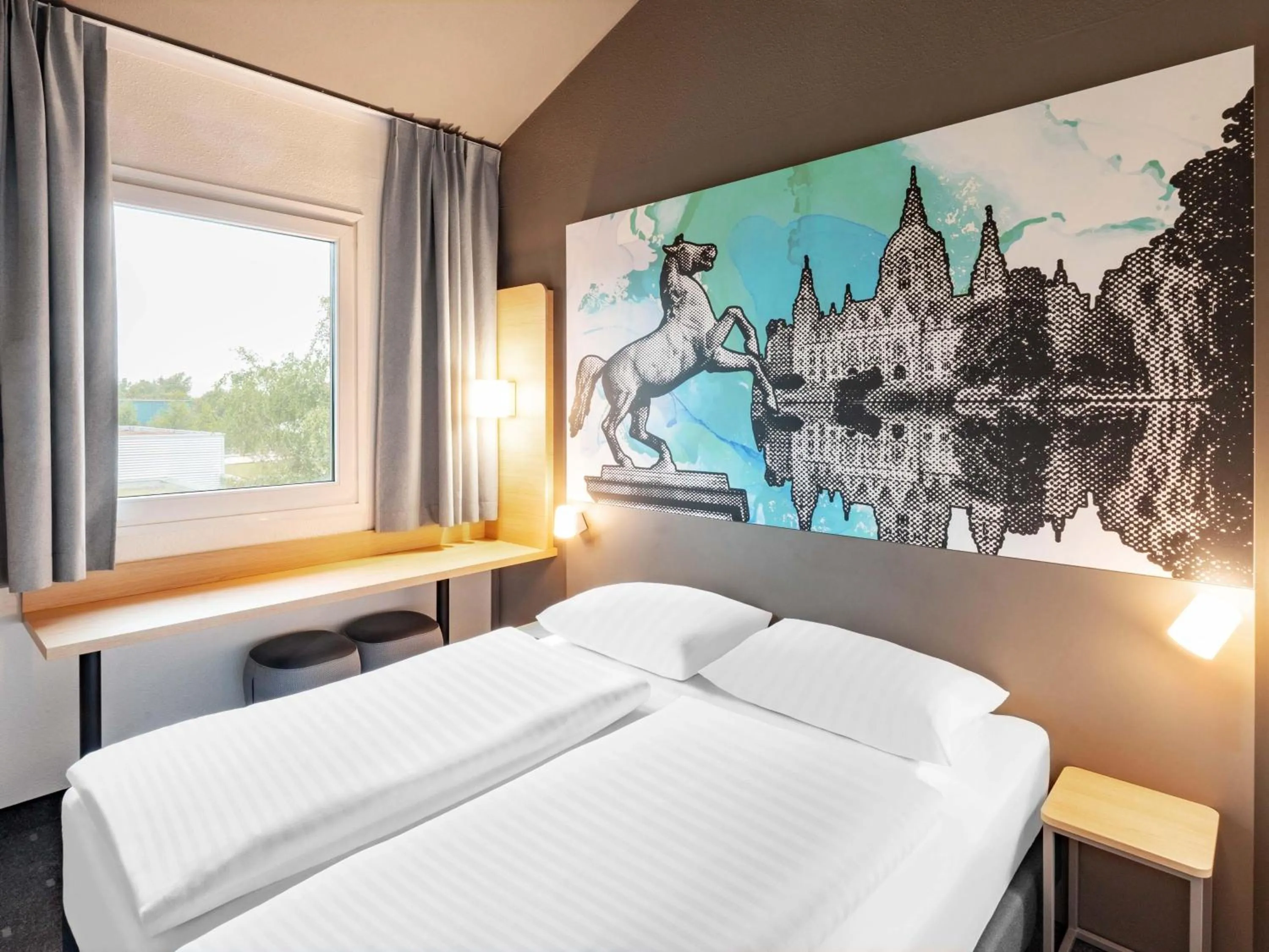 Photo of the whole room, Bed in B&B Hotel Hannover-Nord