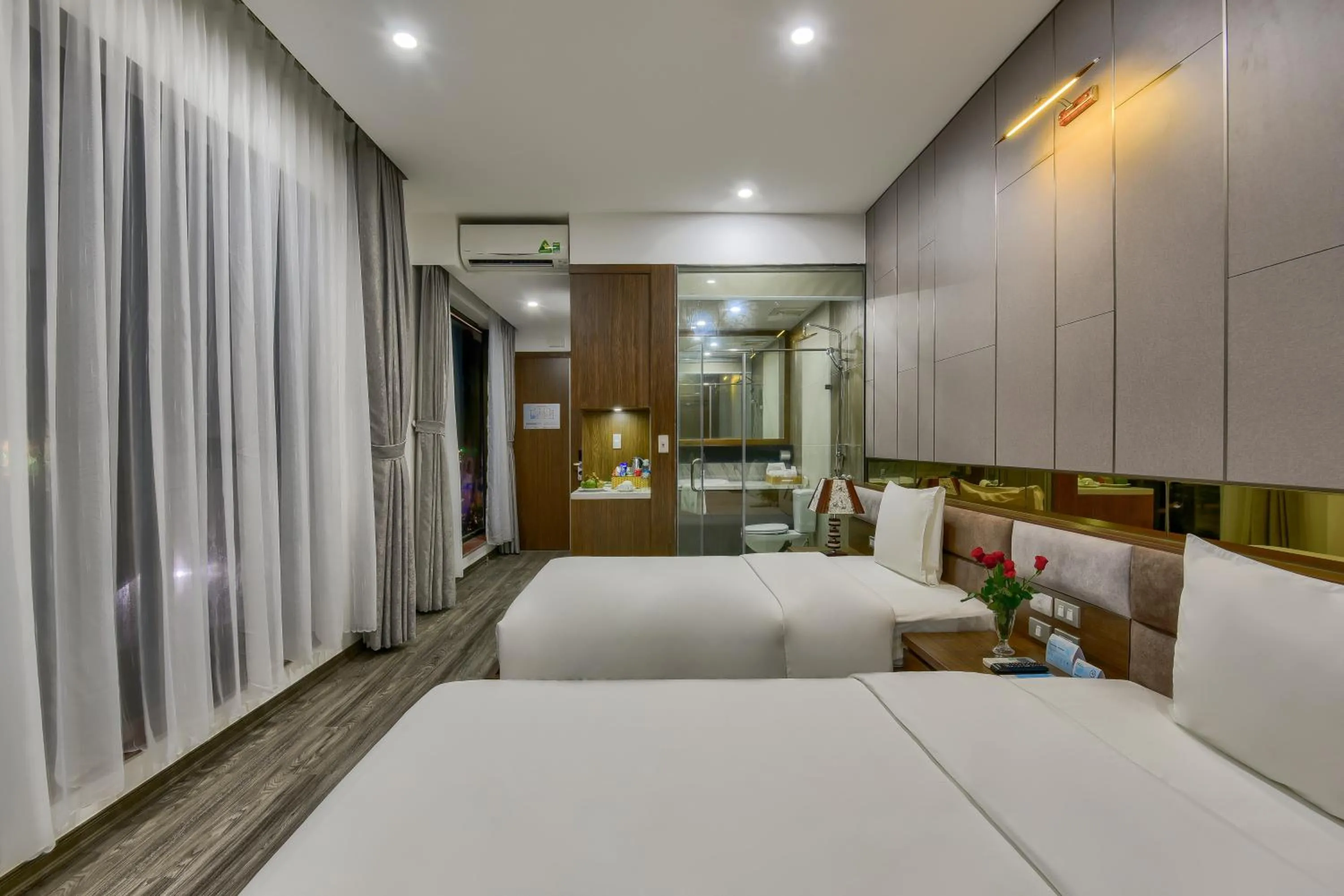 Photo of the whole room, Bed in MANLI Resort Quảng Bình