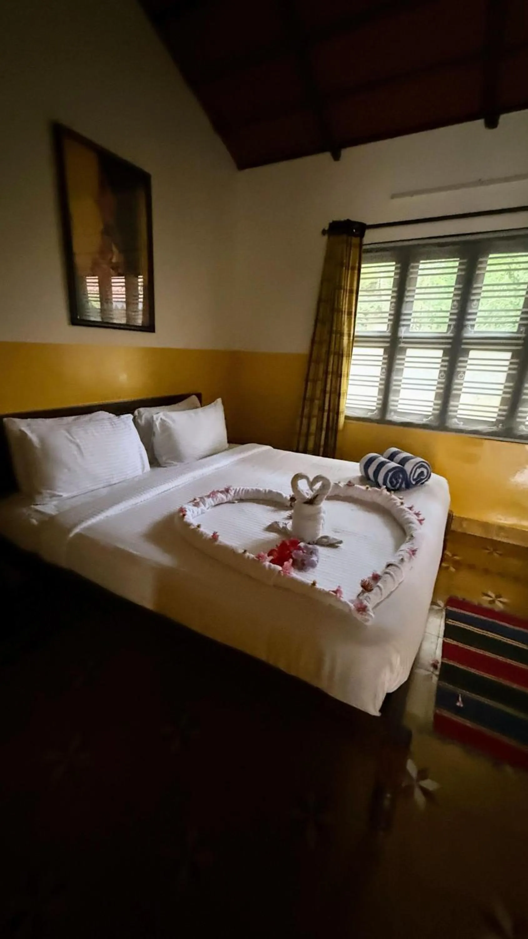 Bed in Marutham Village Resort
