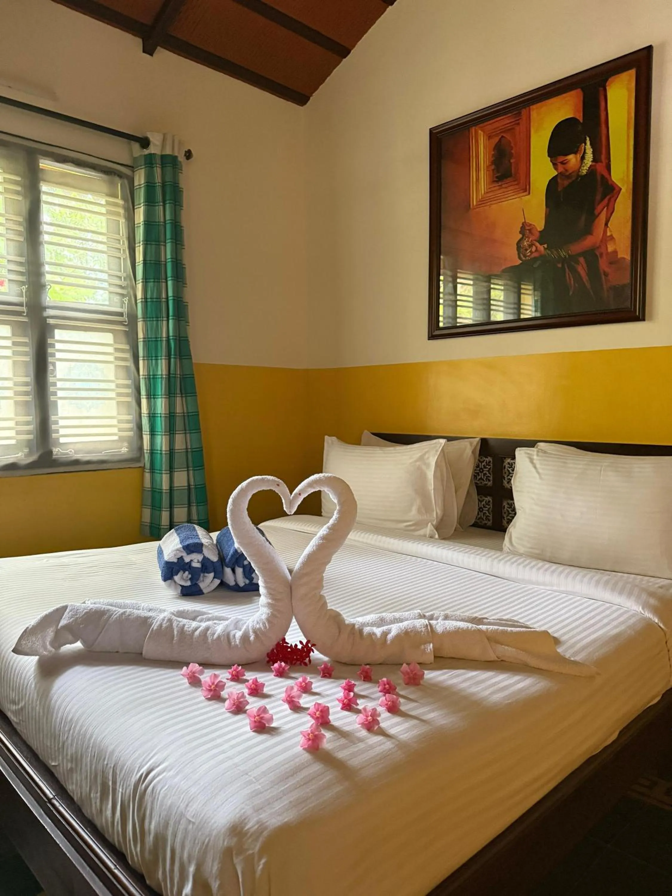 Bed in Marutham Village Resort