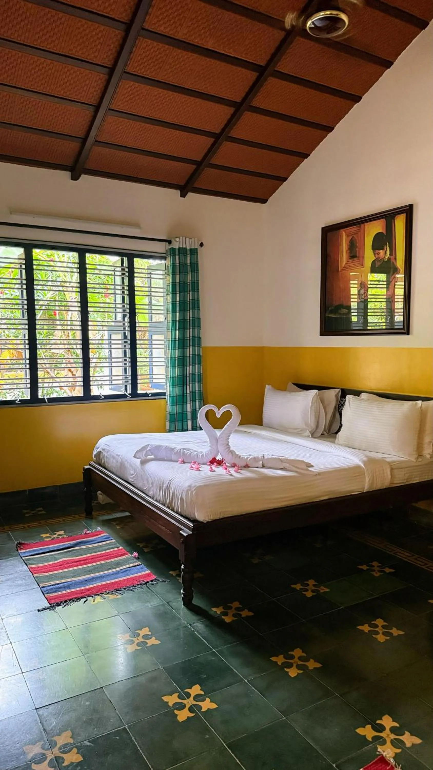 Bed in Marutham Village Resort