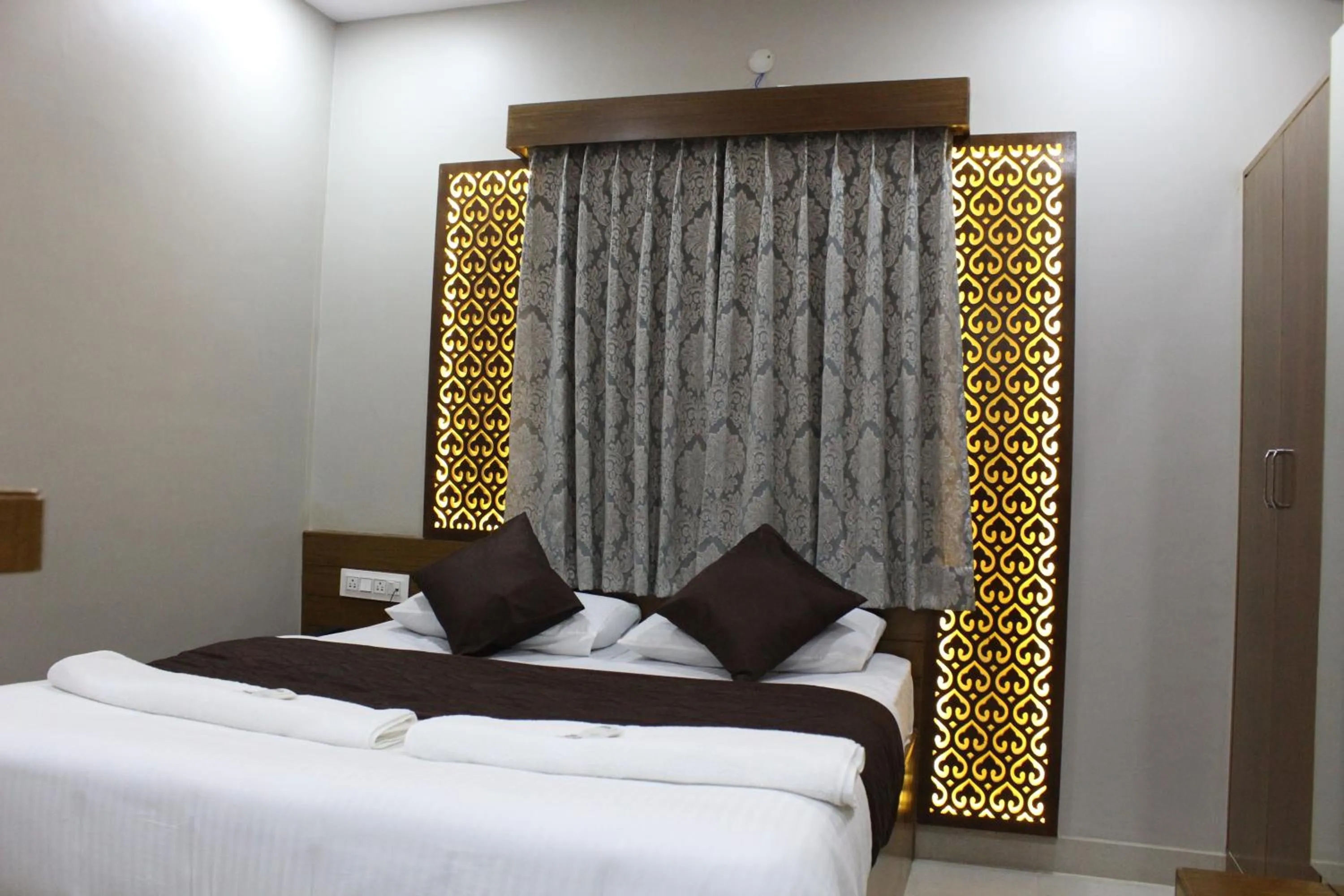 Bed in Olivia Inn And Suites