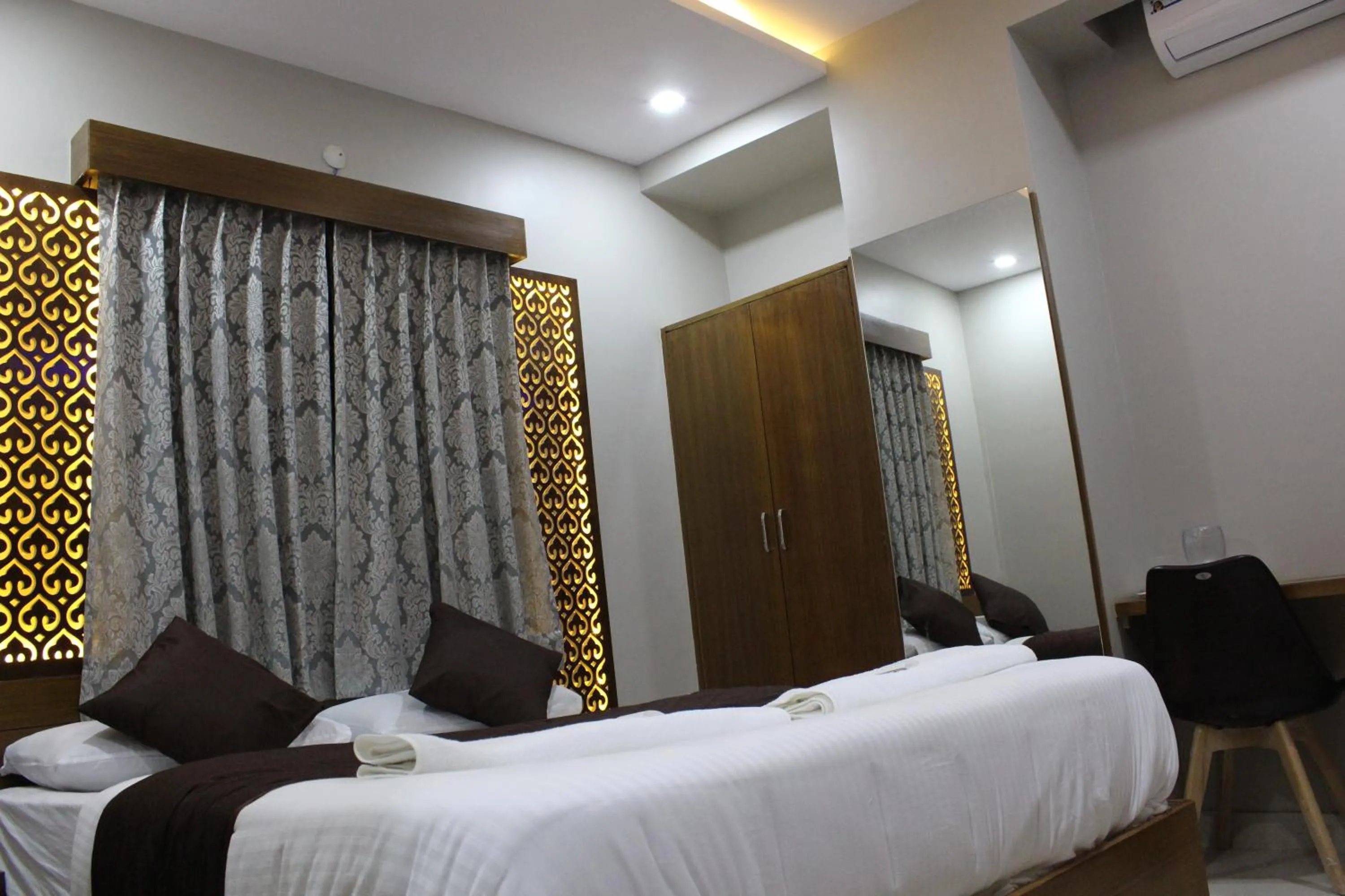 Bed in Olivia Inn And Suites