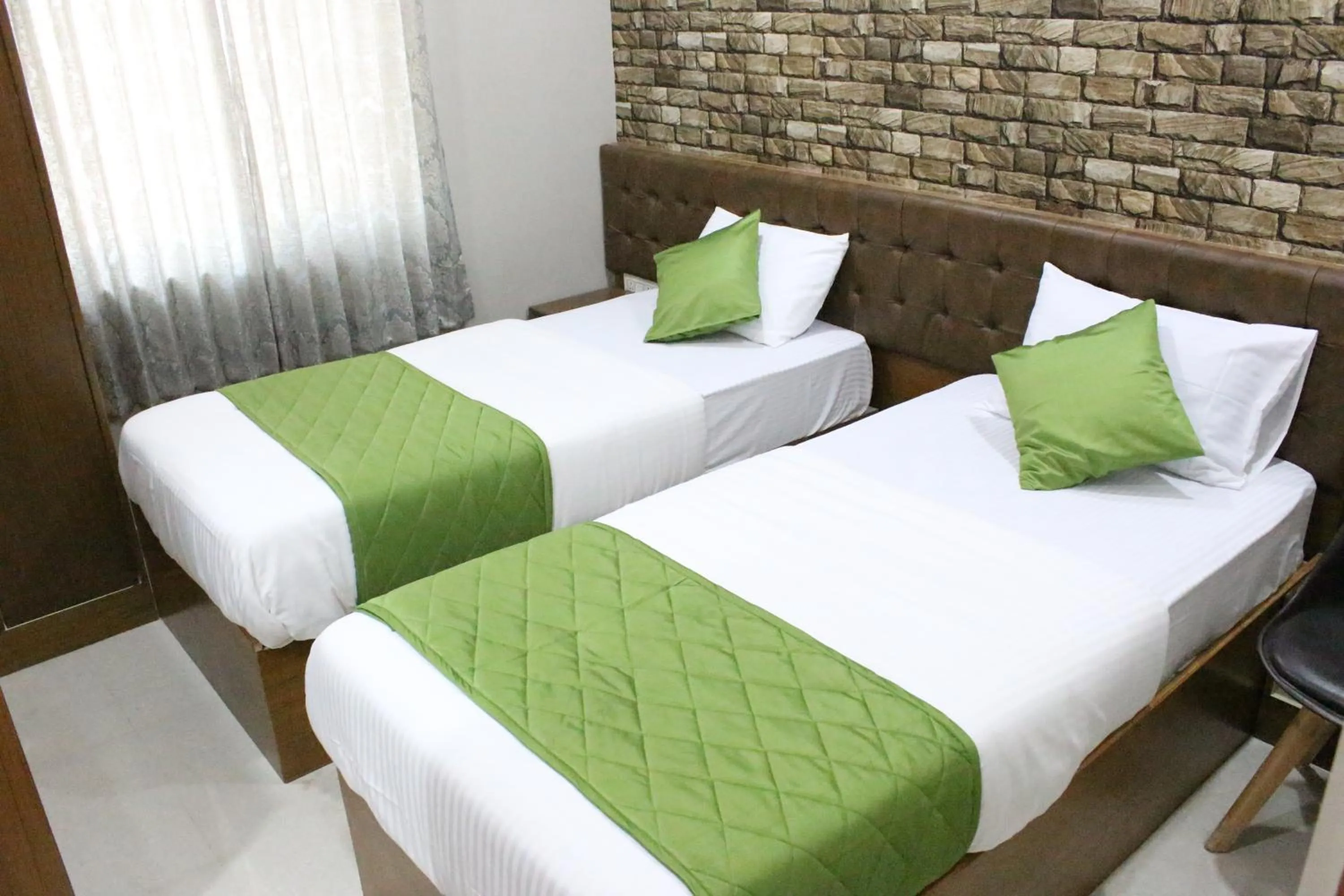 Bed in Olivia Inn And Suites