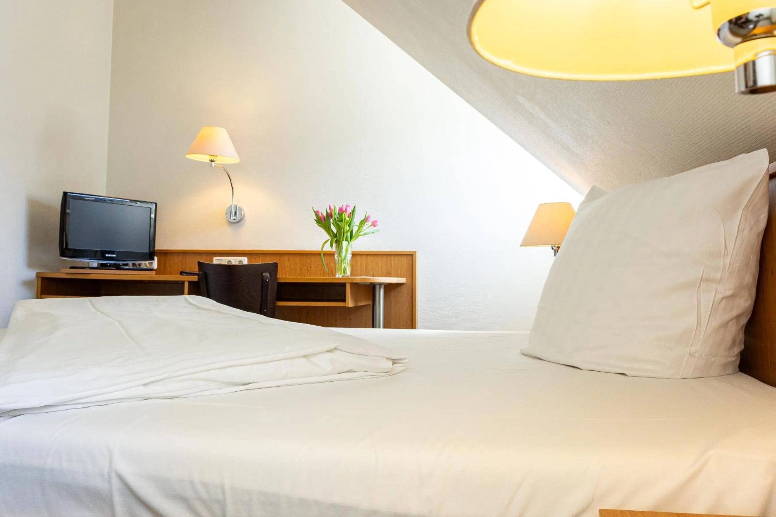 Bed in Hotel Aulmann