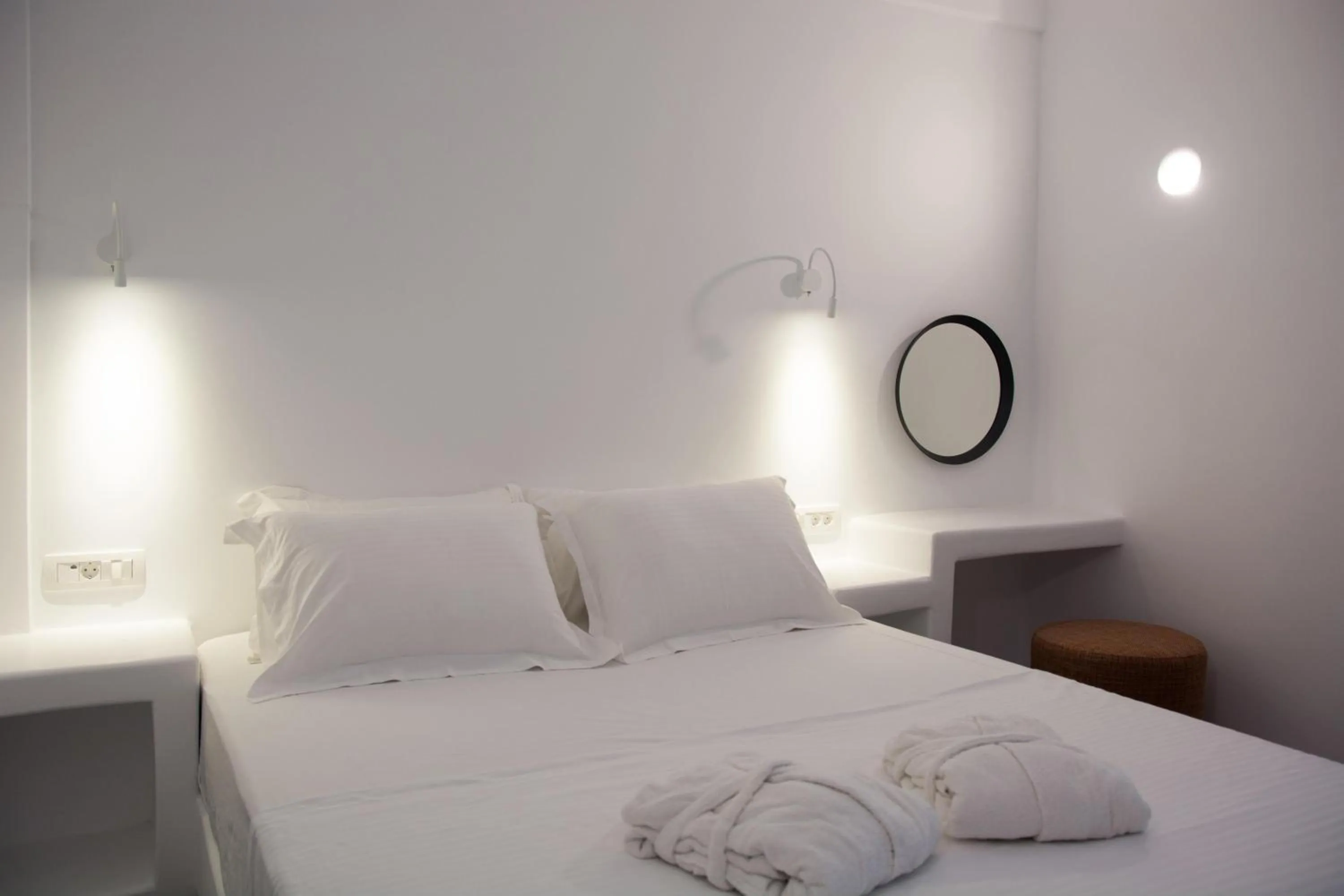 Bed in Amphitrite Suites Santorini