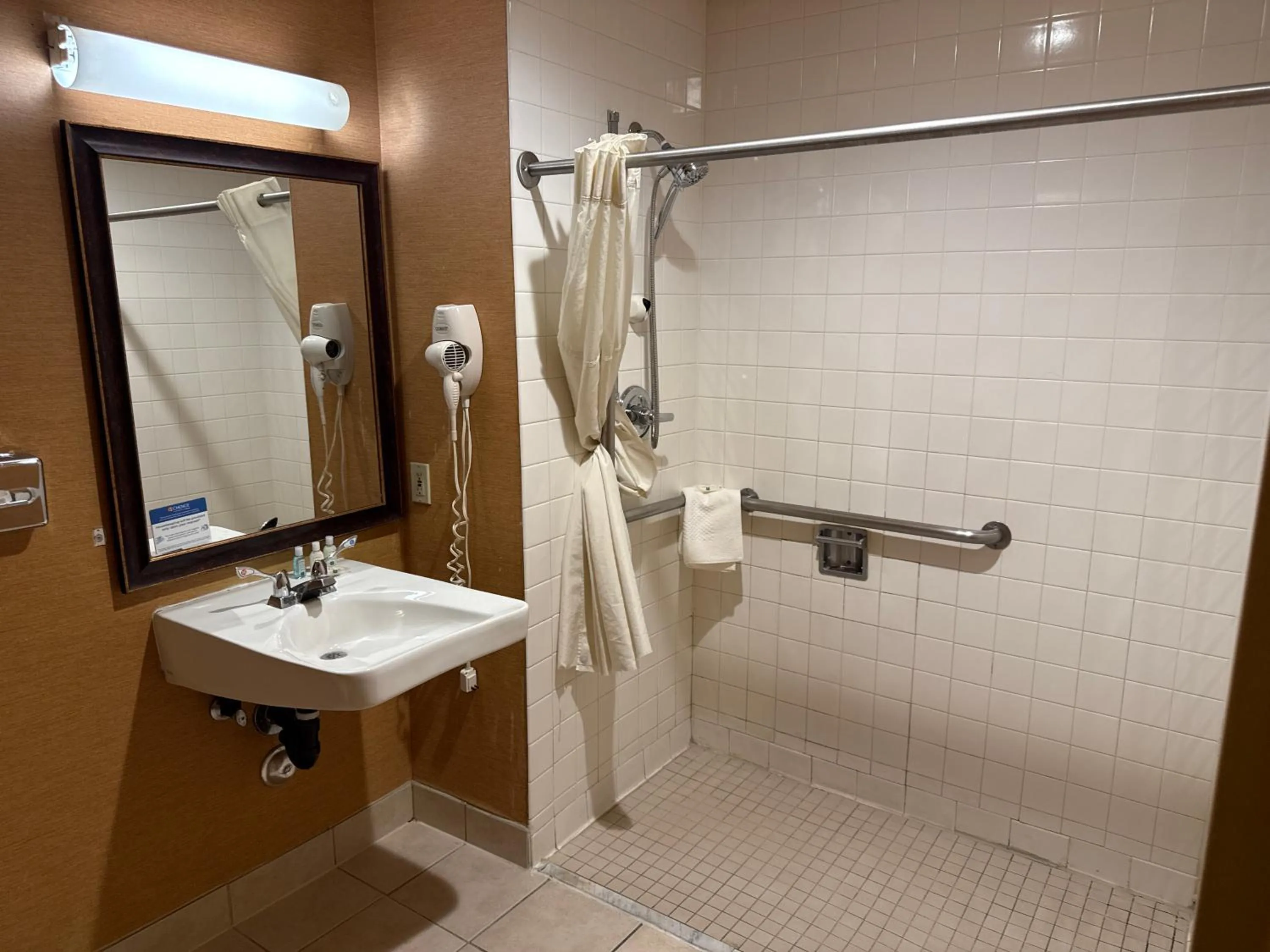 Bathroom in Quality Inn and Conference Center Greeley Downtown
