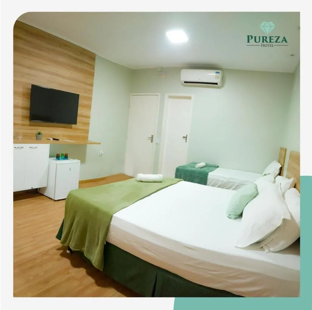 Bed in Pureza Hotel