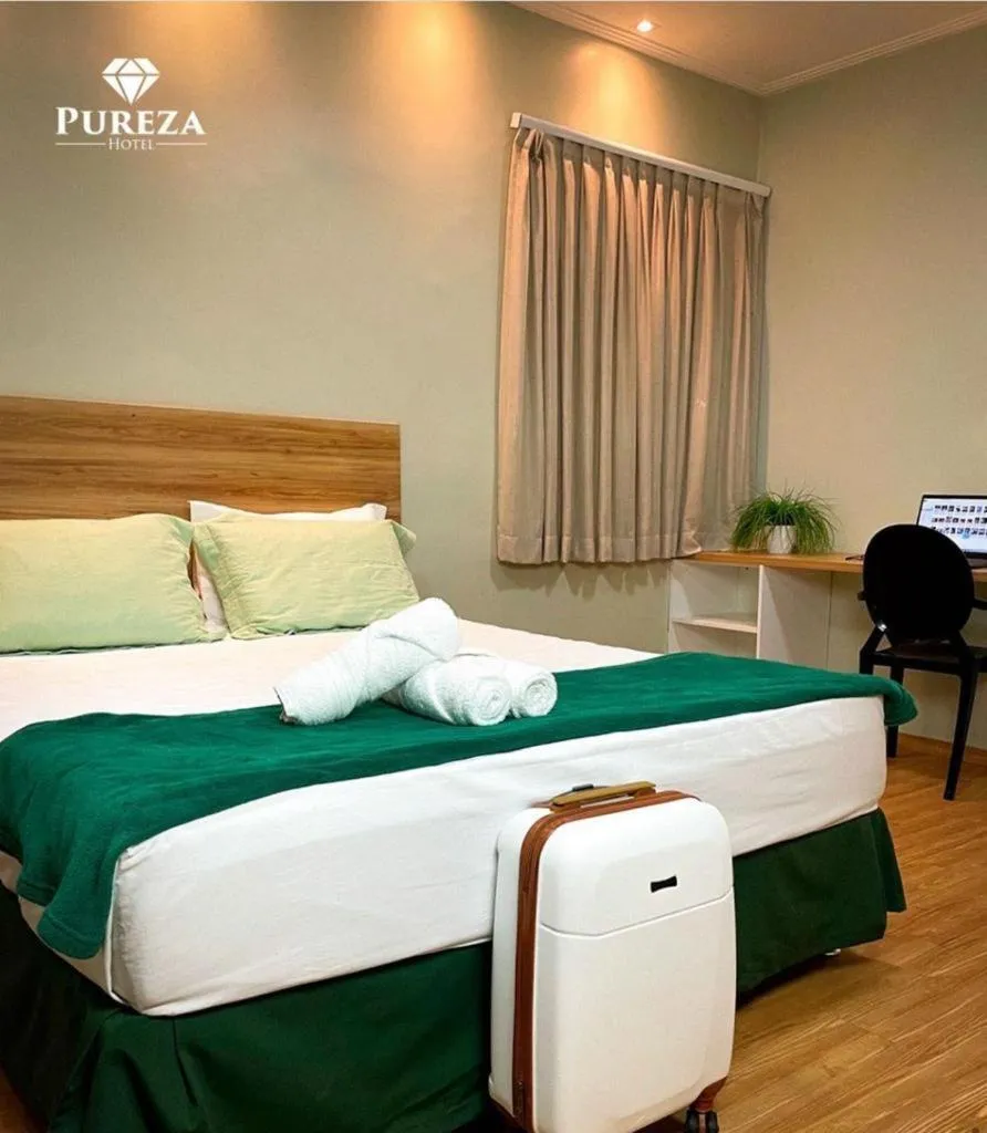 Bed in Pureza Hotel