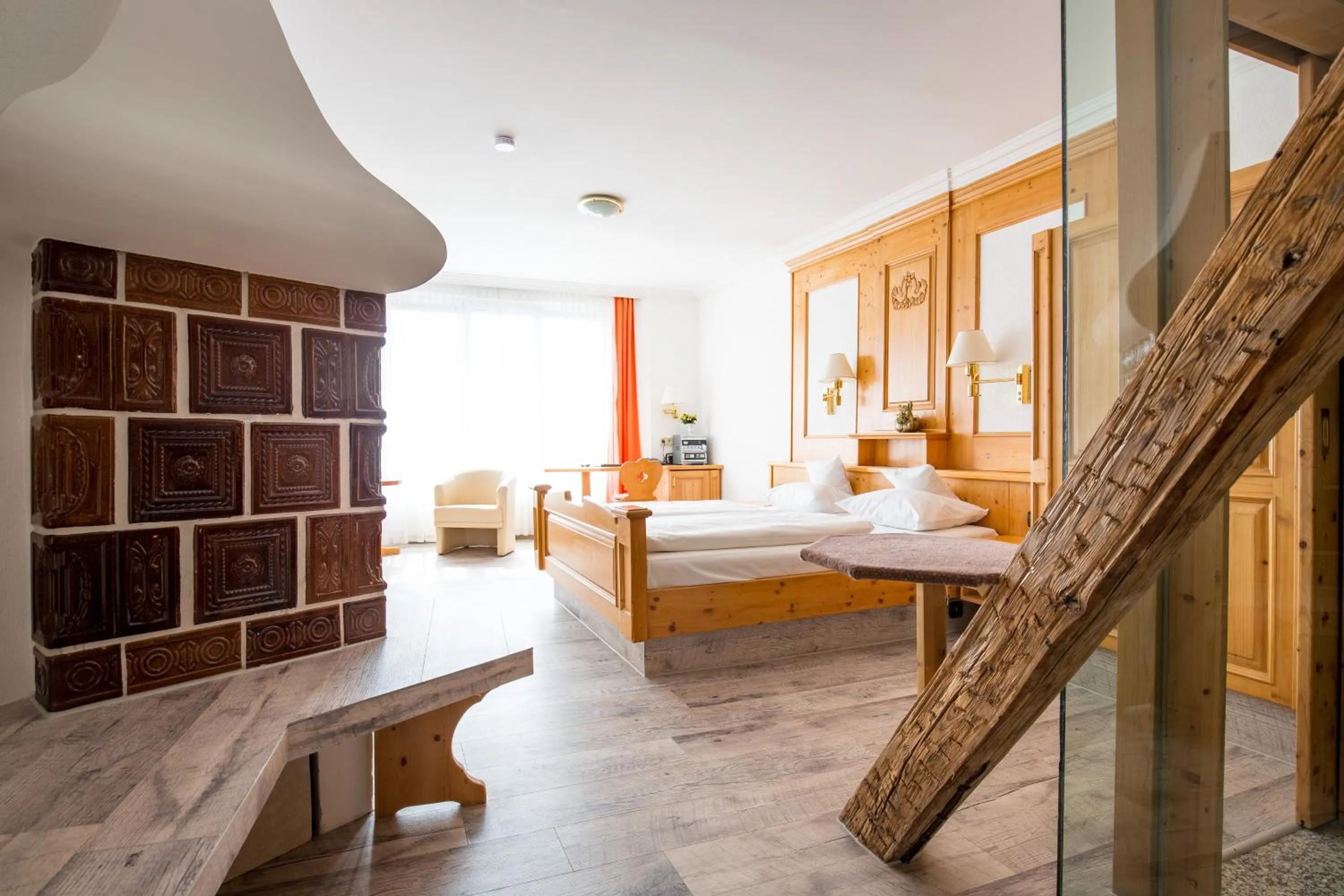 Living room, Bed in AAAA Hotelwelt KÜBLER