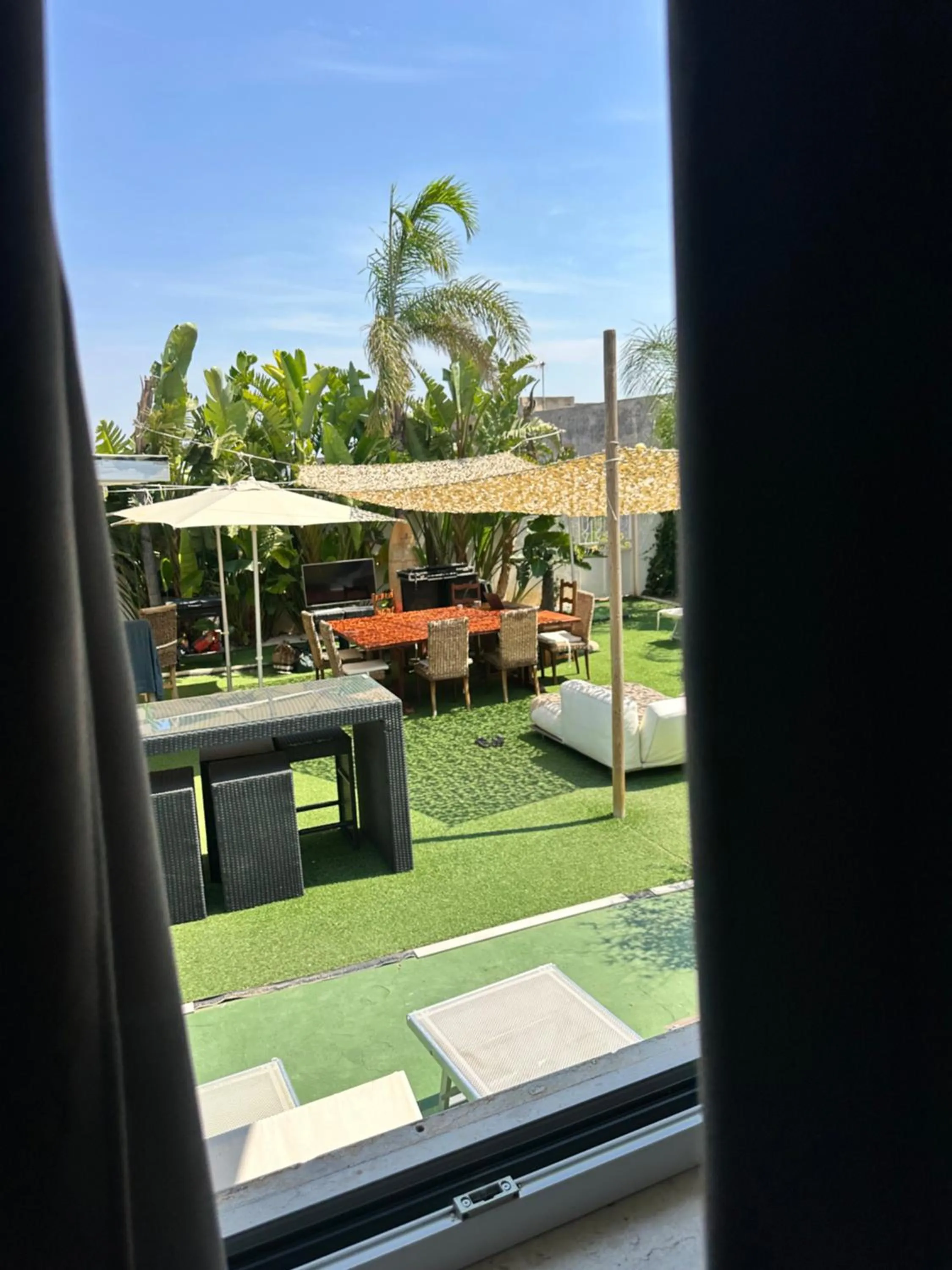 Garden view in Sunset Wave - STAGNONE KITESURF VILLAGE