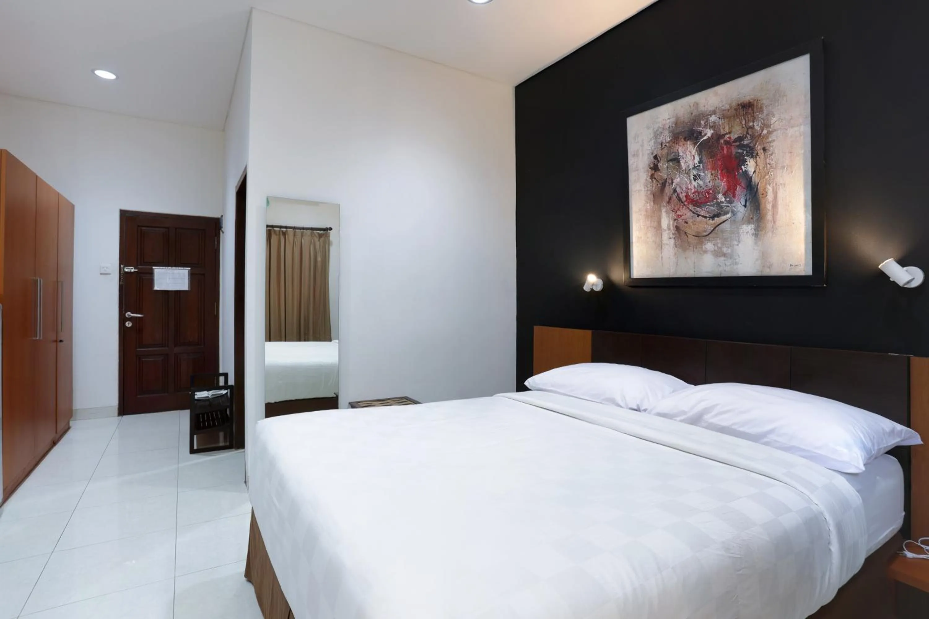 Bedroom, Bed in Jambuluwuk Heritage Menteng Suites