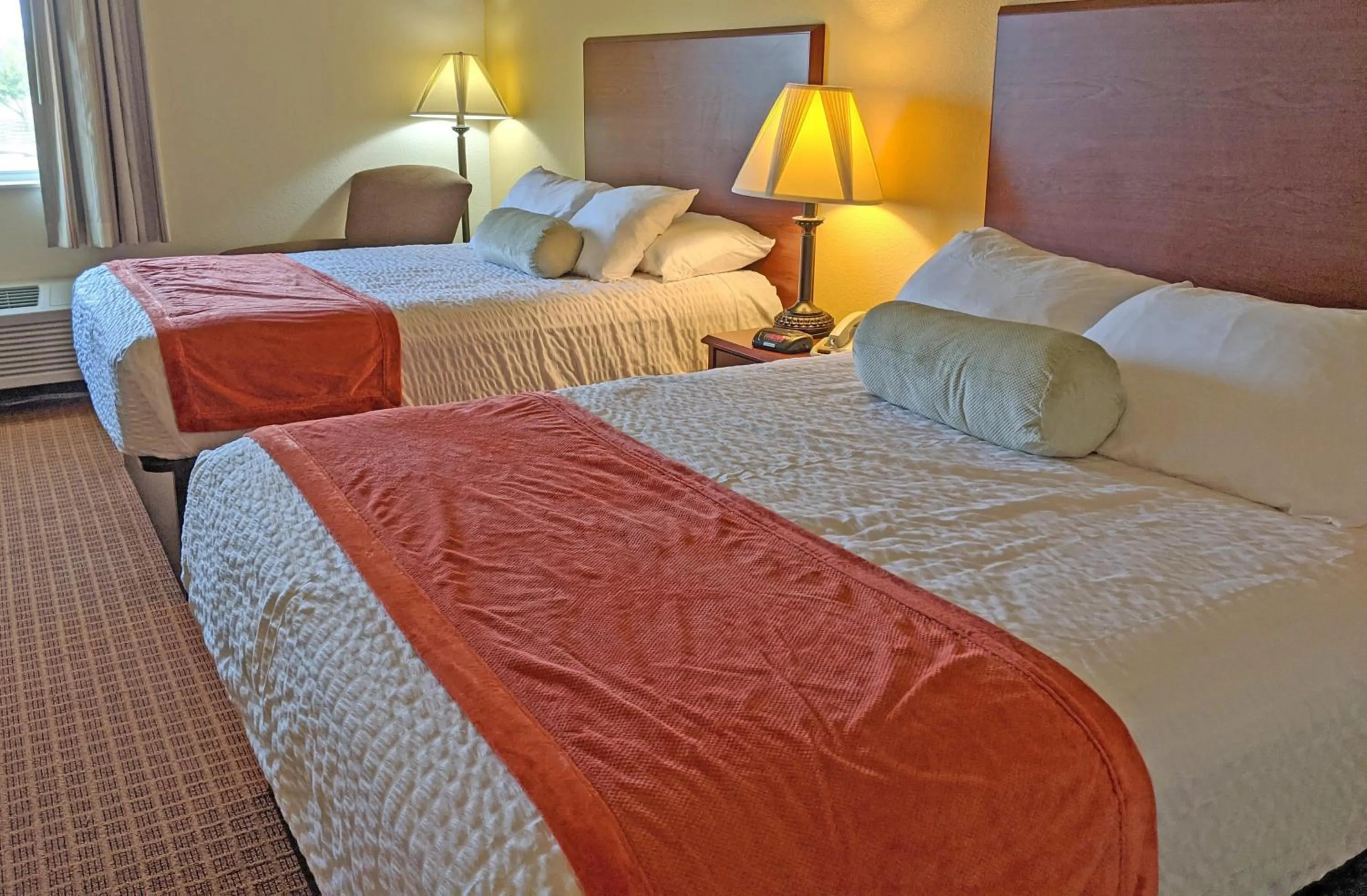 Bedroom in Rodeway Inn & Suites Hoisington