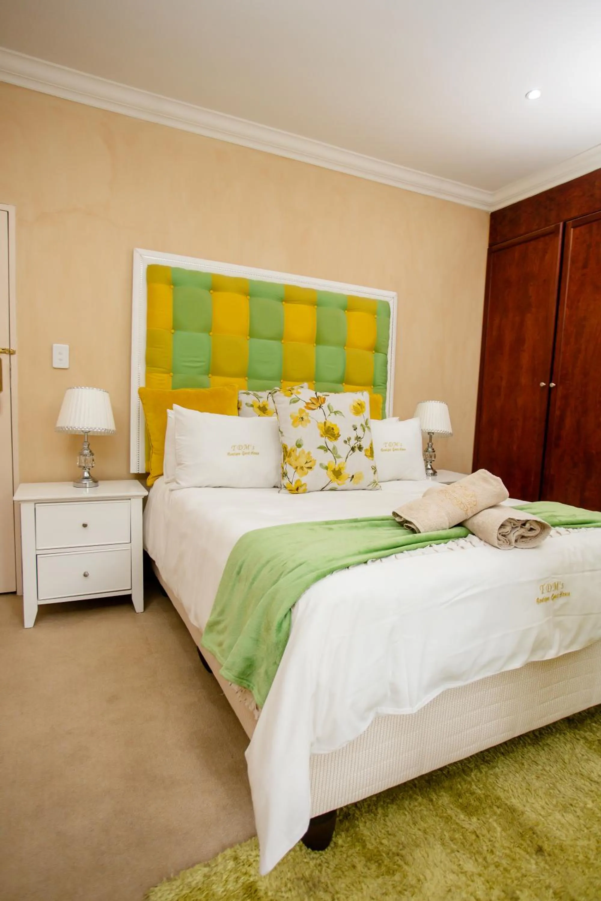 Bed in TDM's Boutique Guest House