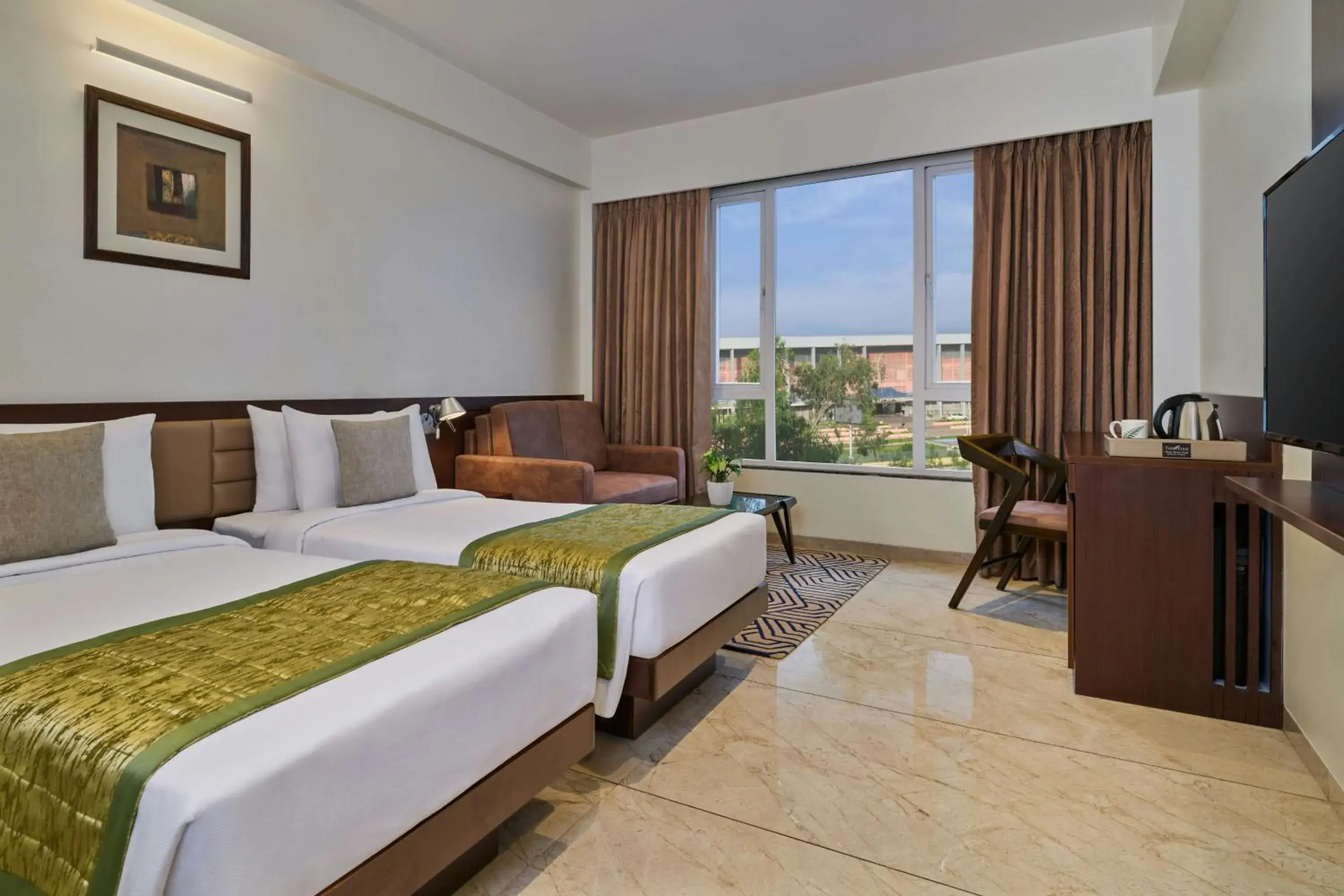 Winter Green Twin Room with Balcony and City View in The Fern Sardar Sarovar Resort Kevadia, Gujarat, Series by Marriott Winter Green Twin Room with Balcony and City View in The Fern Sardar Sarovar Resort Kevadia, Gujarat, Series by Marriott