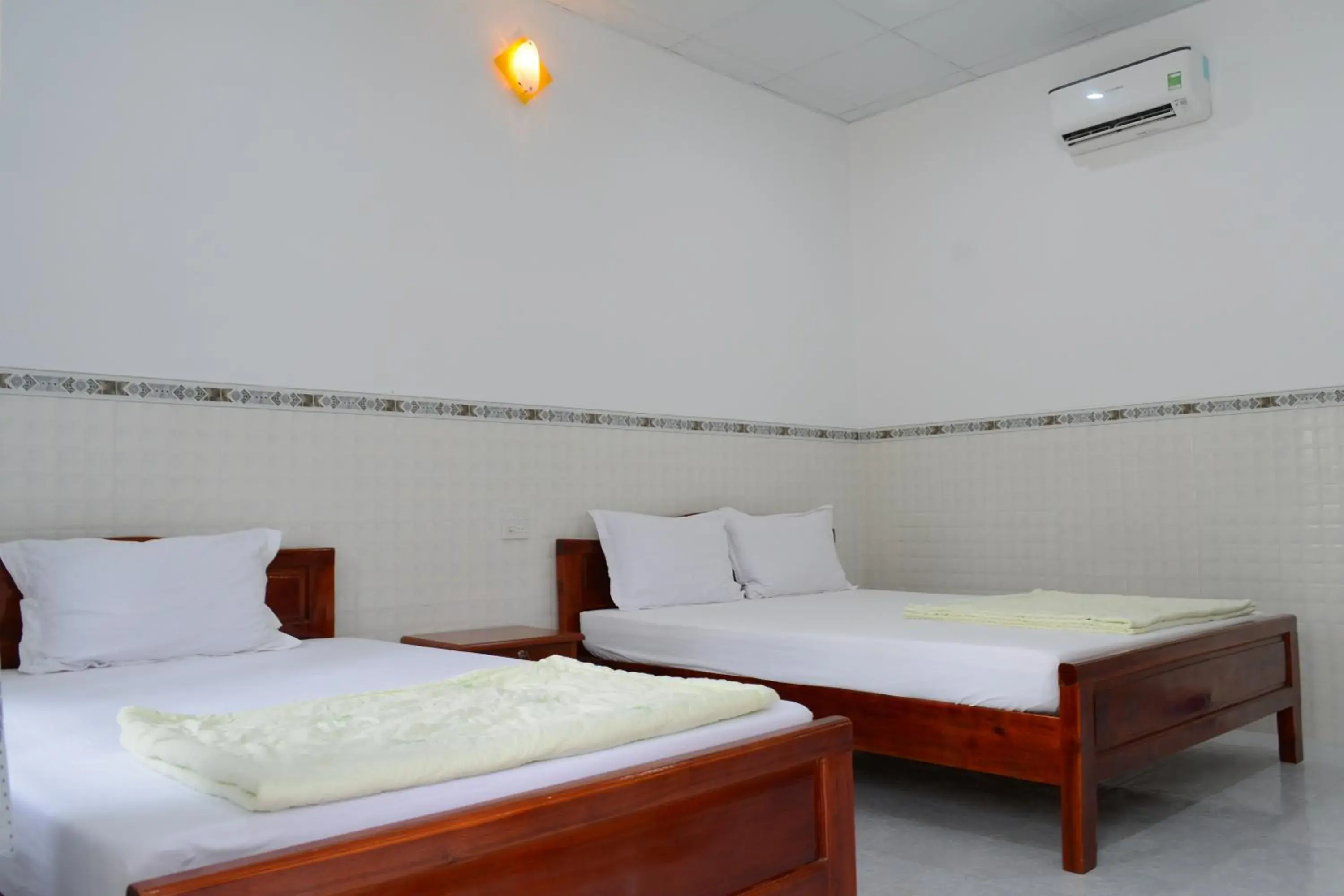 Standard Triple Room in Diem Lien Guesthouse Standard Triple Room in Diem Lien Guesthouse