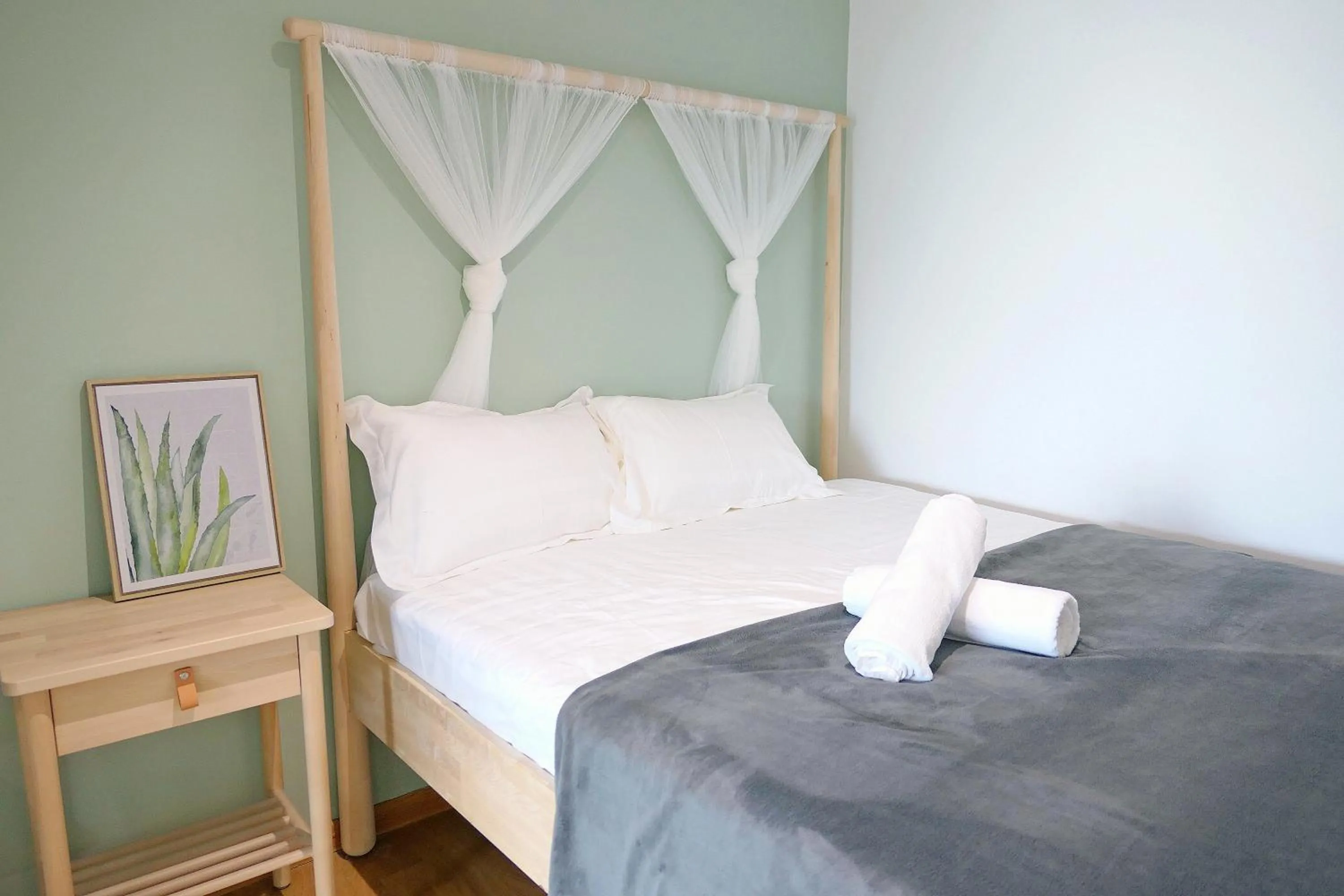 Bed in EkoCheras Cozy Suite by DreamScape