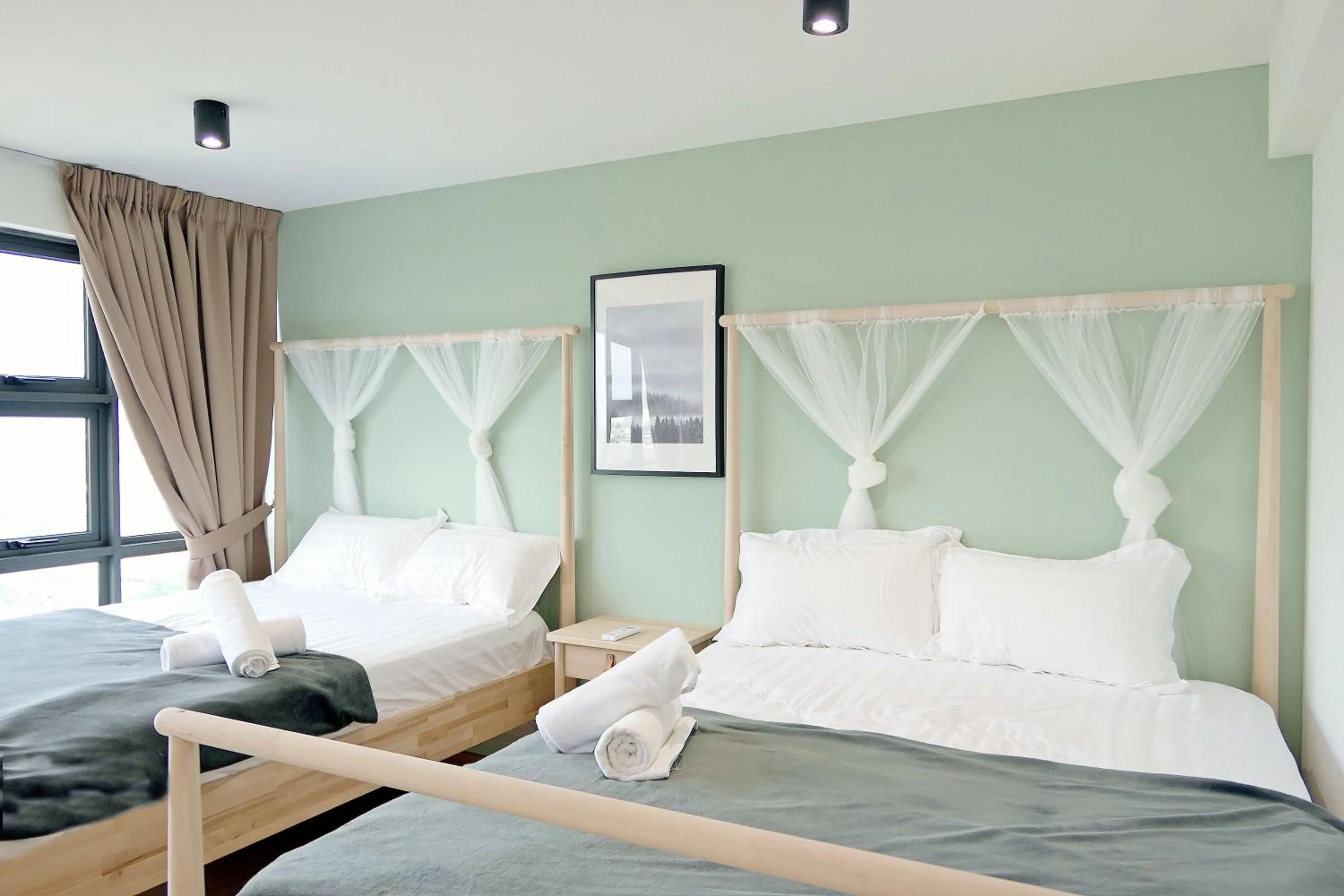 Bed in EkoCheras Cozy Suite by DreamScape