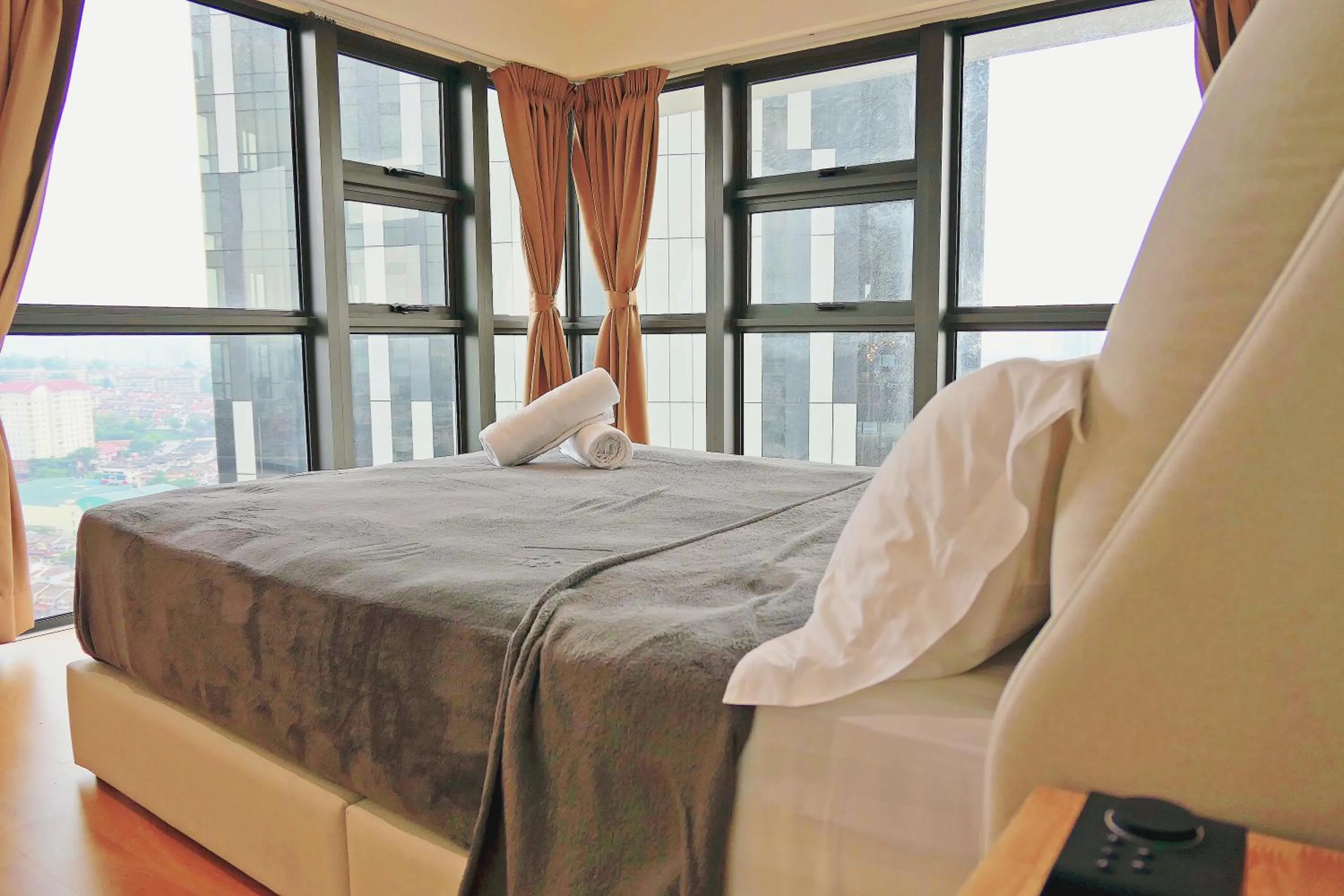 Bed in EkoCheras Cozy Suite by DreamScape