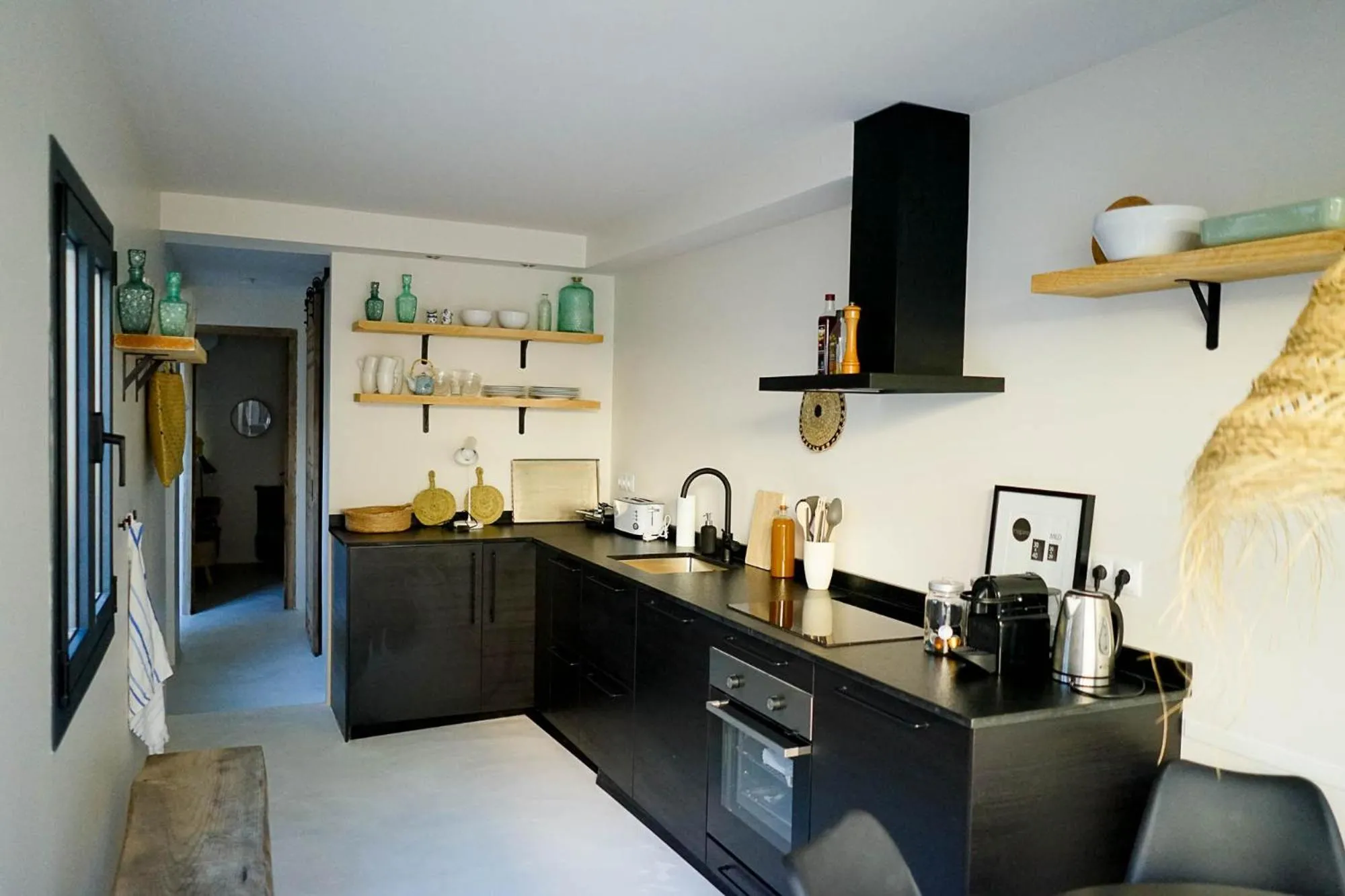 Kitchen or kitchenette in Ronda Center Apartments with Pool