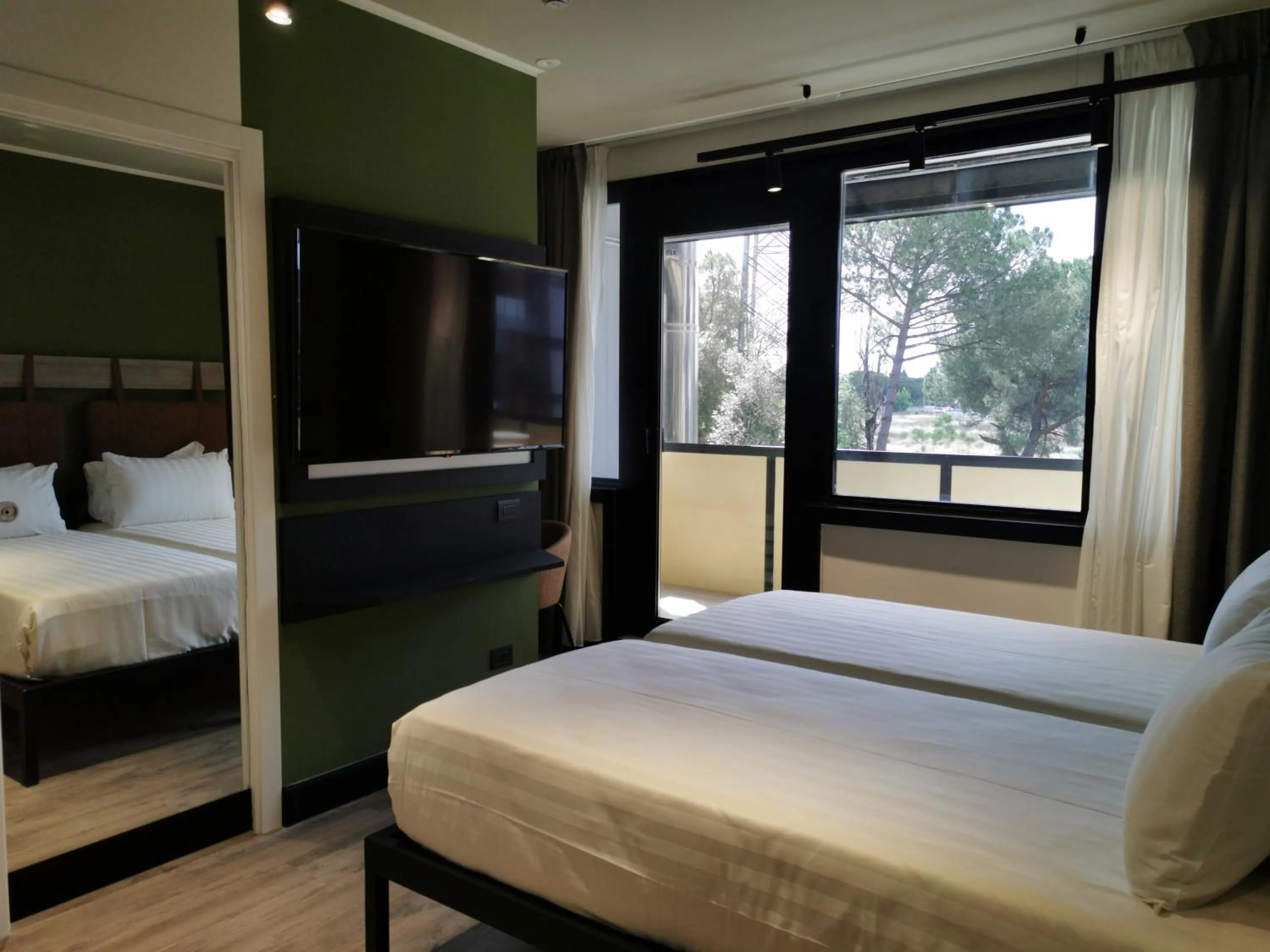 Bed in Mercure Roma Cinecitta