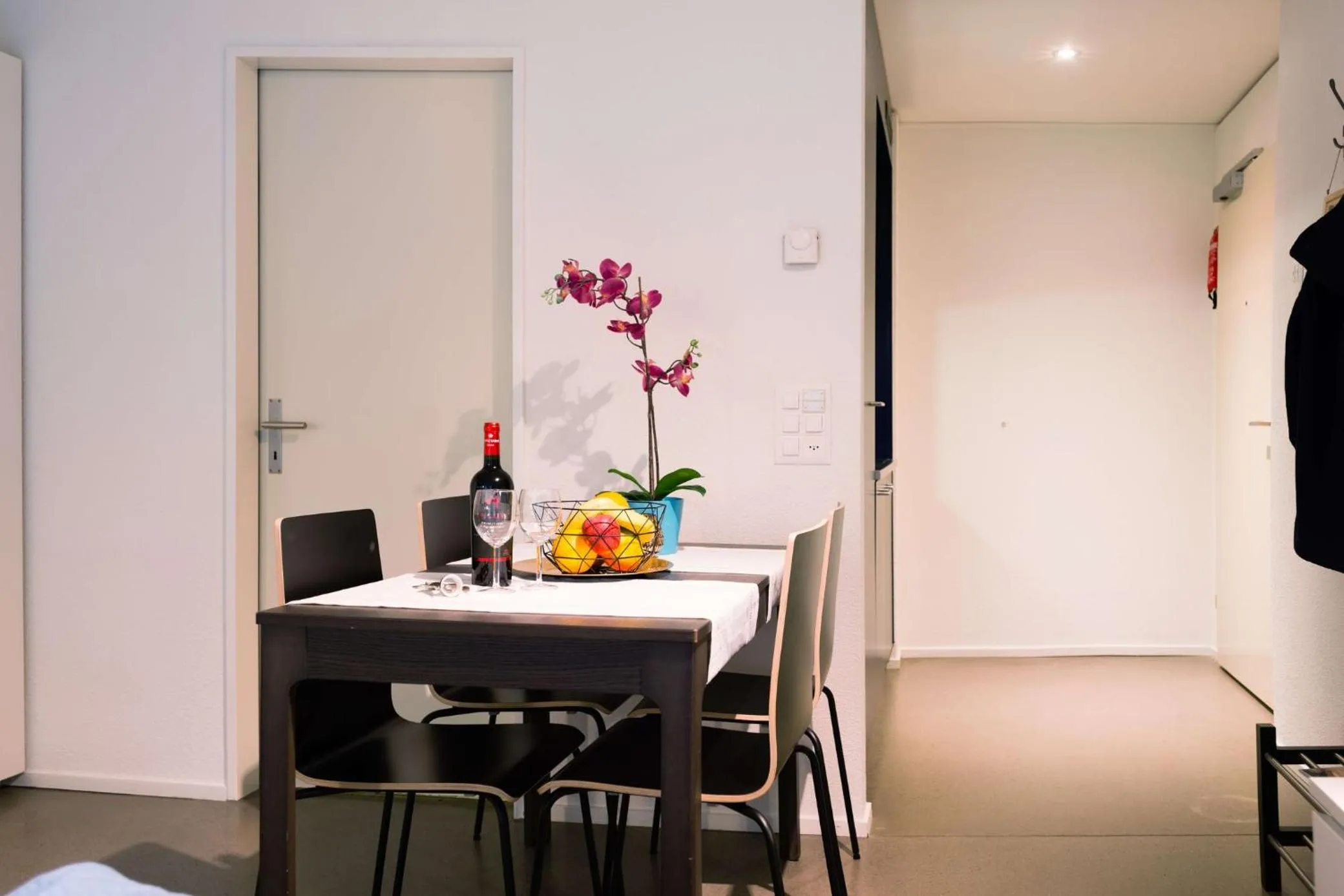 Seating area in HITrental Allmend Comfort Studios