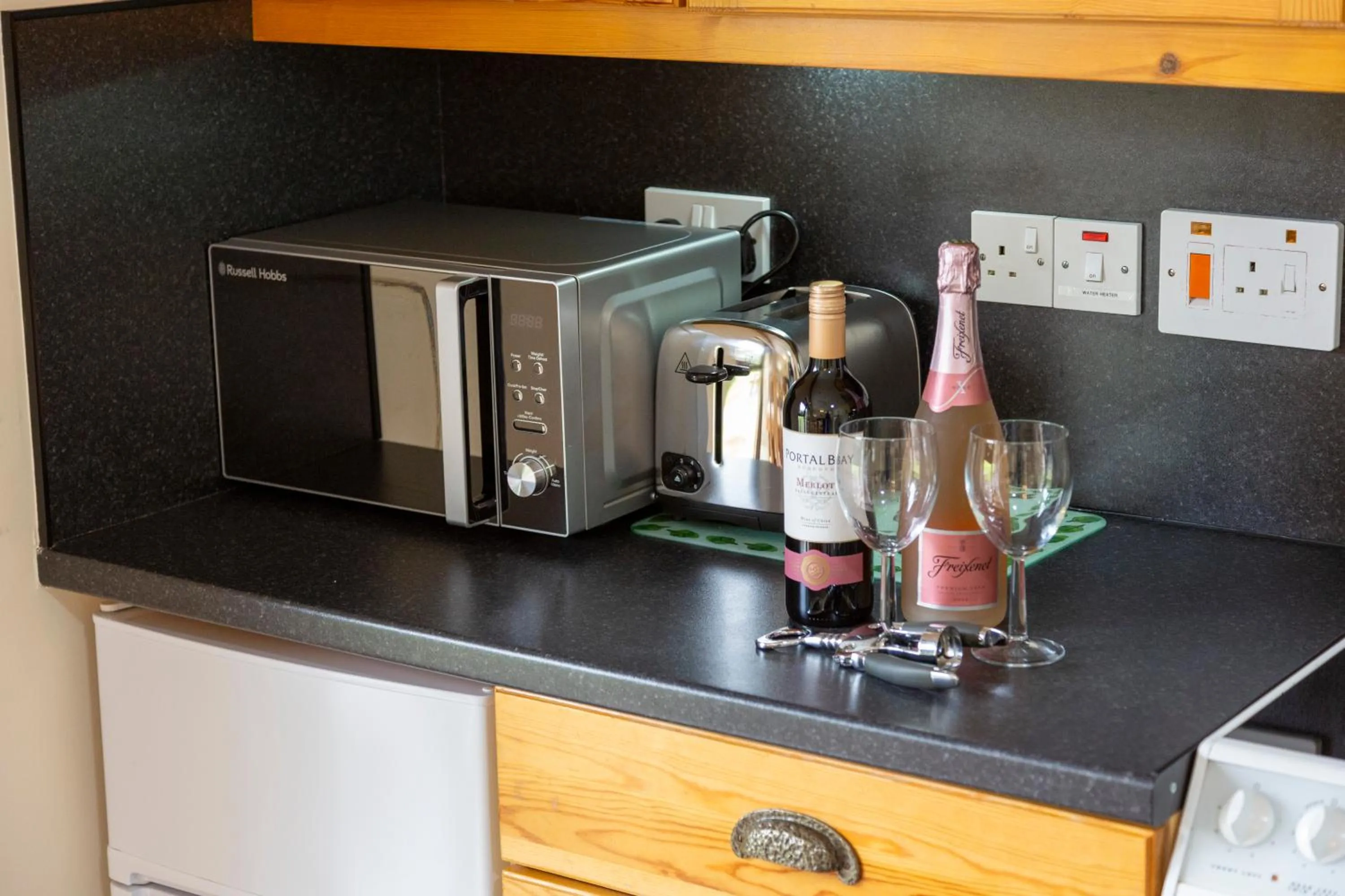 Kitchen or kitchenette in Scandinavian Village Ltd