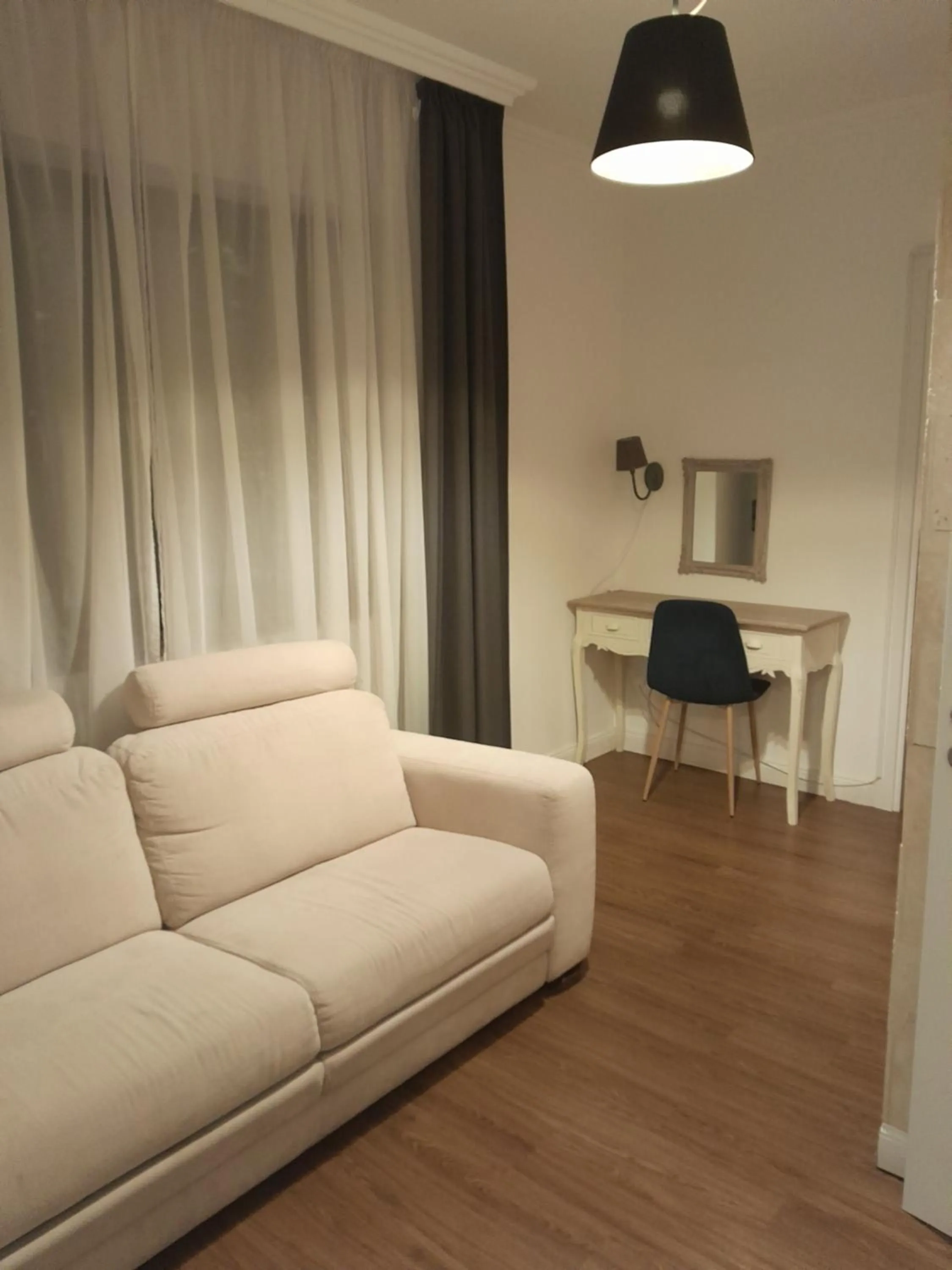 Living room in Éjjeli Bagoly Étterem és Panzió