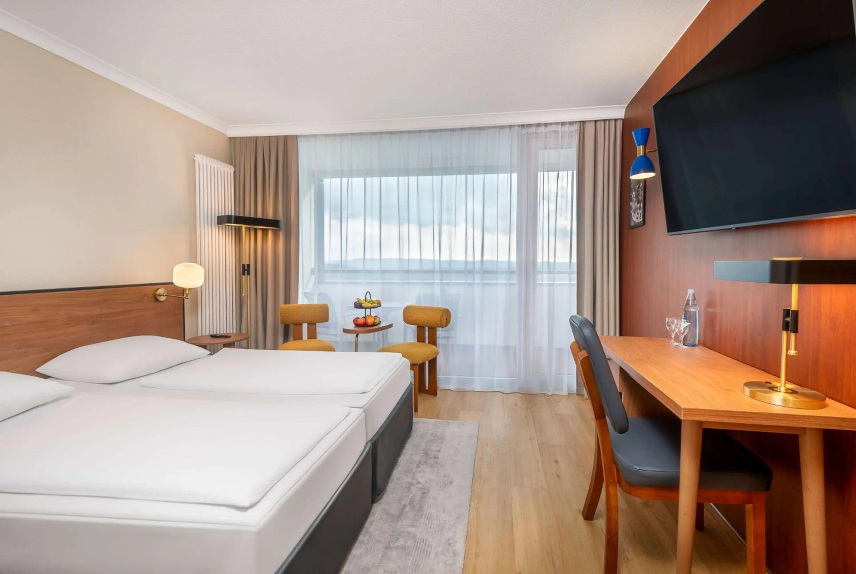 Photo of the whole room, Bed in Wyndham Garden Lahnstein Koblenz