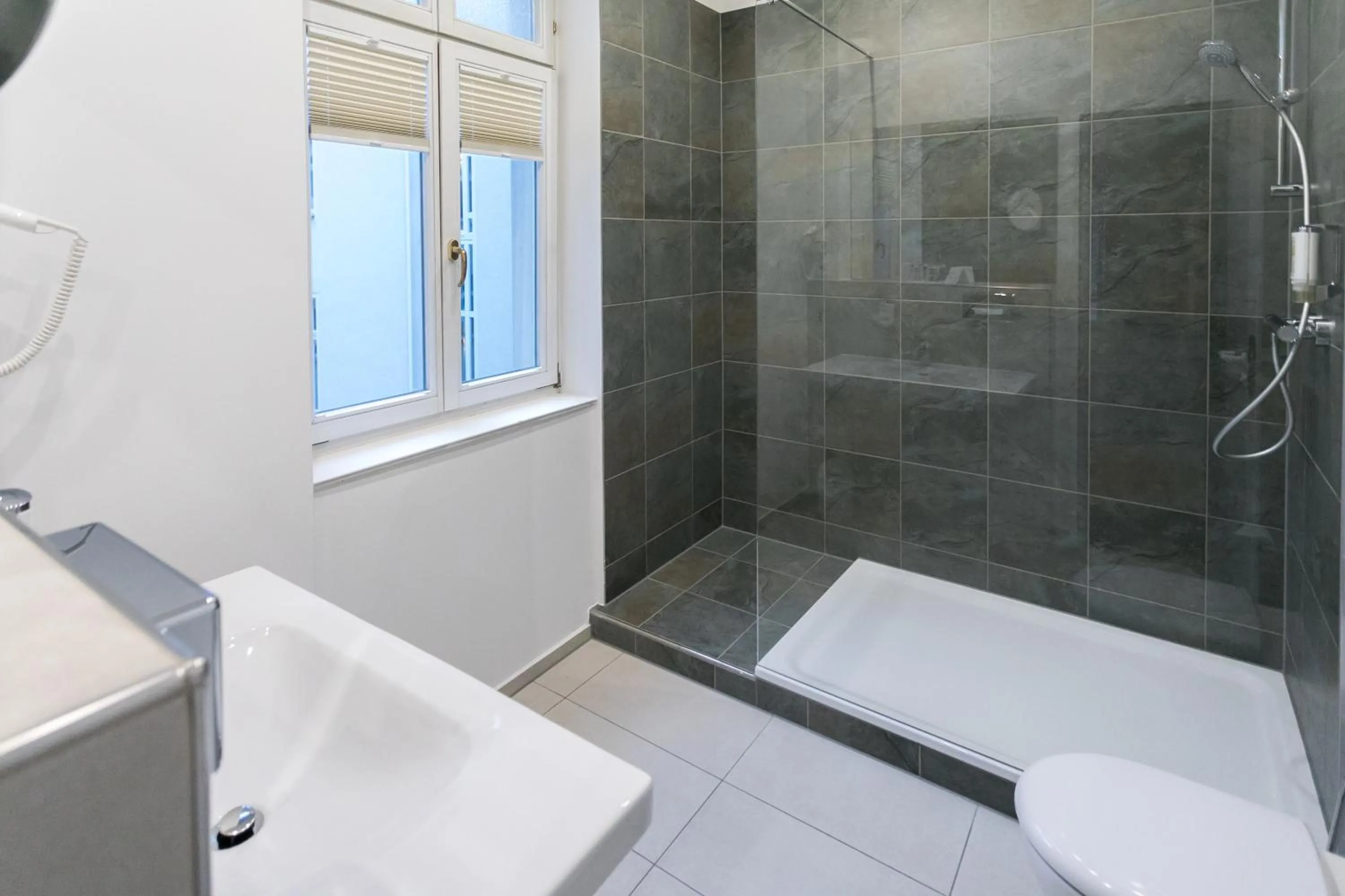 Shower in martas Hotel Allegra Berlin