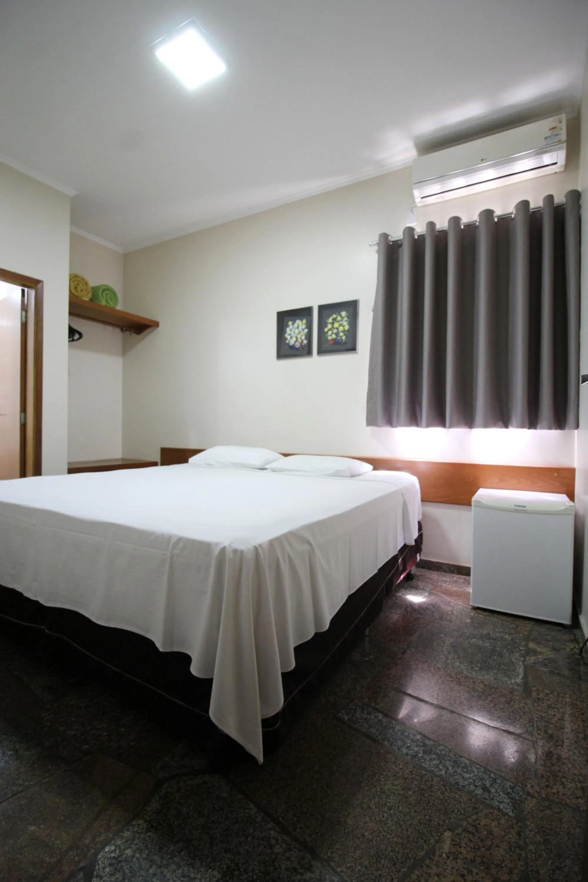 Bed in Pousada Água Eterna