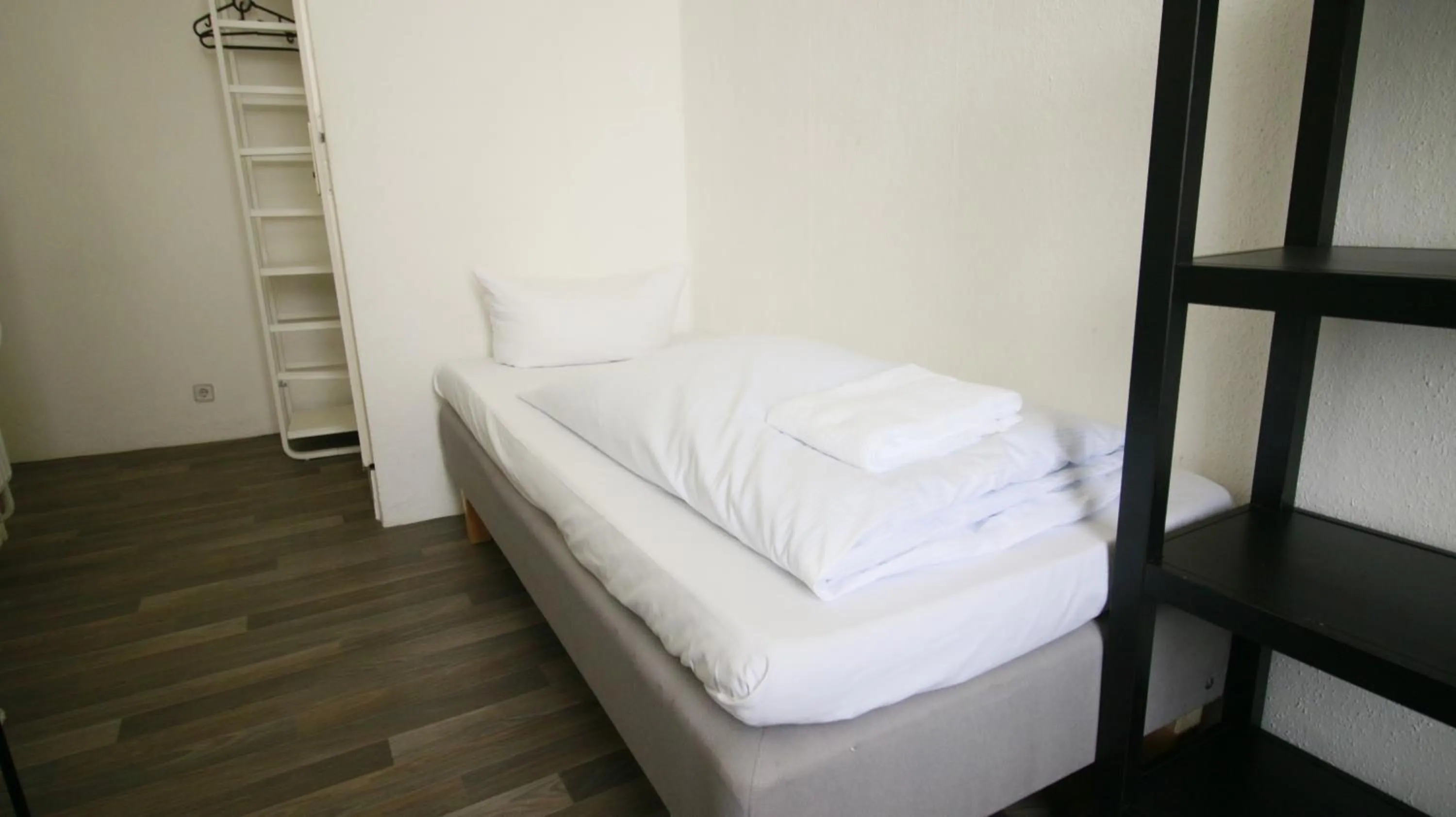 Bed in Hotel Bee Fang