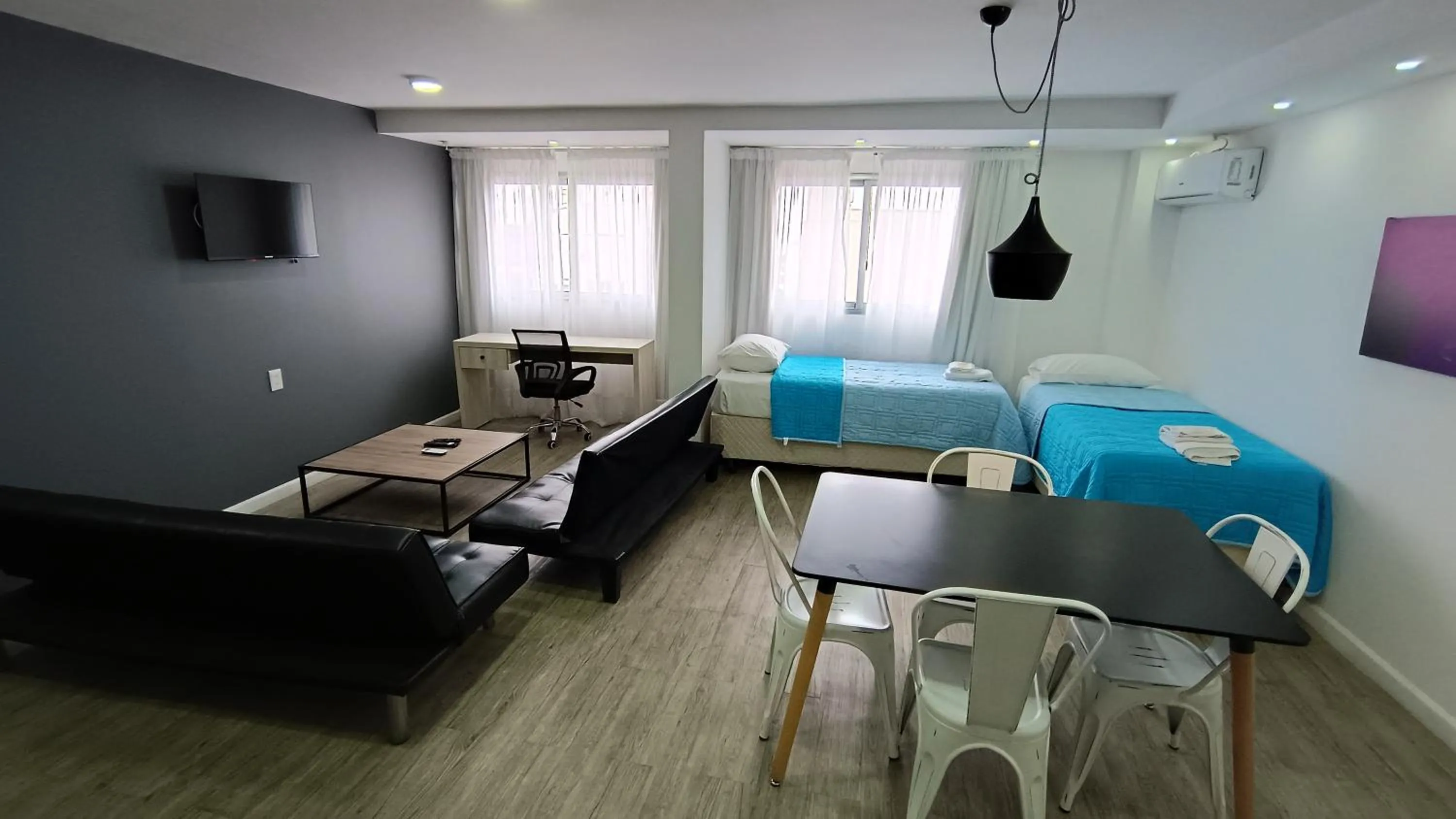 Living room in Quijano Hotel - Aparts & Suites