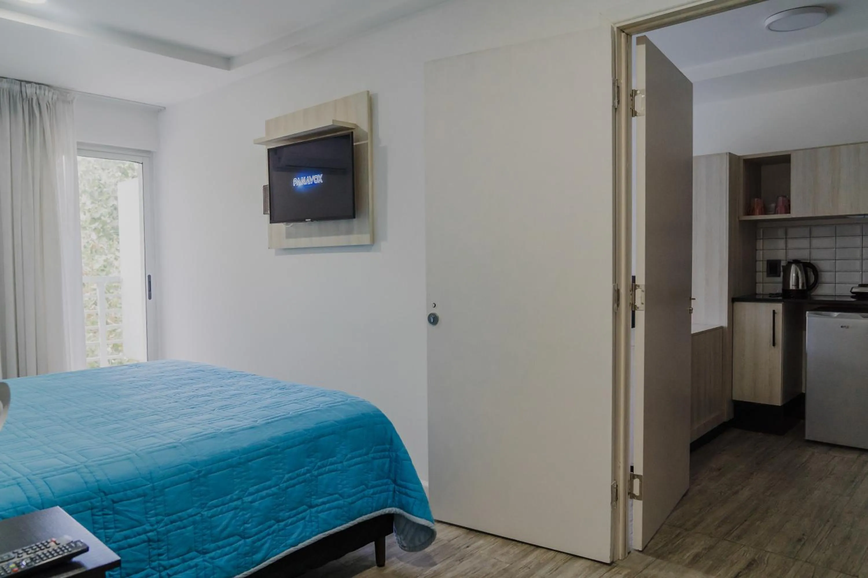 Bed in Quijano Hotel - Aparts & Suites