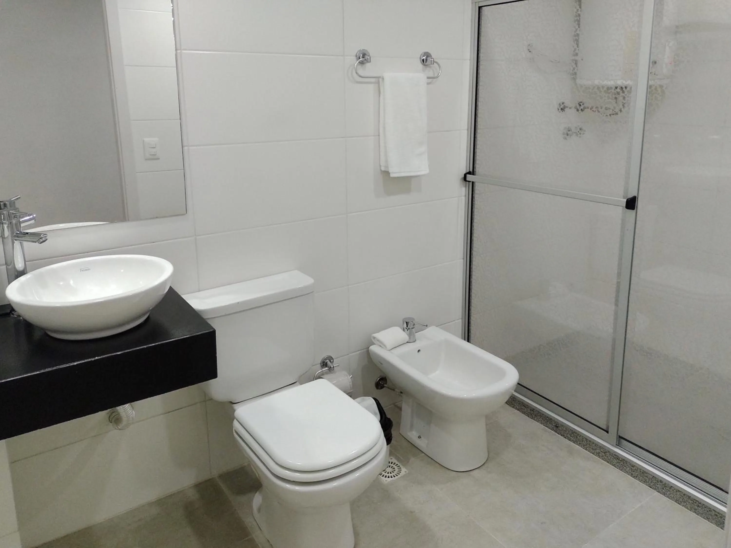 Bathroom in Quijano Hotel - Aparts & Suites