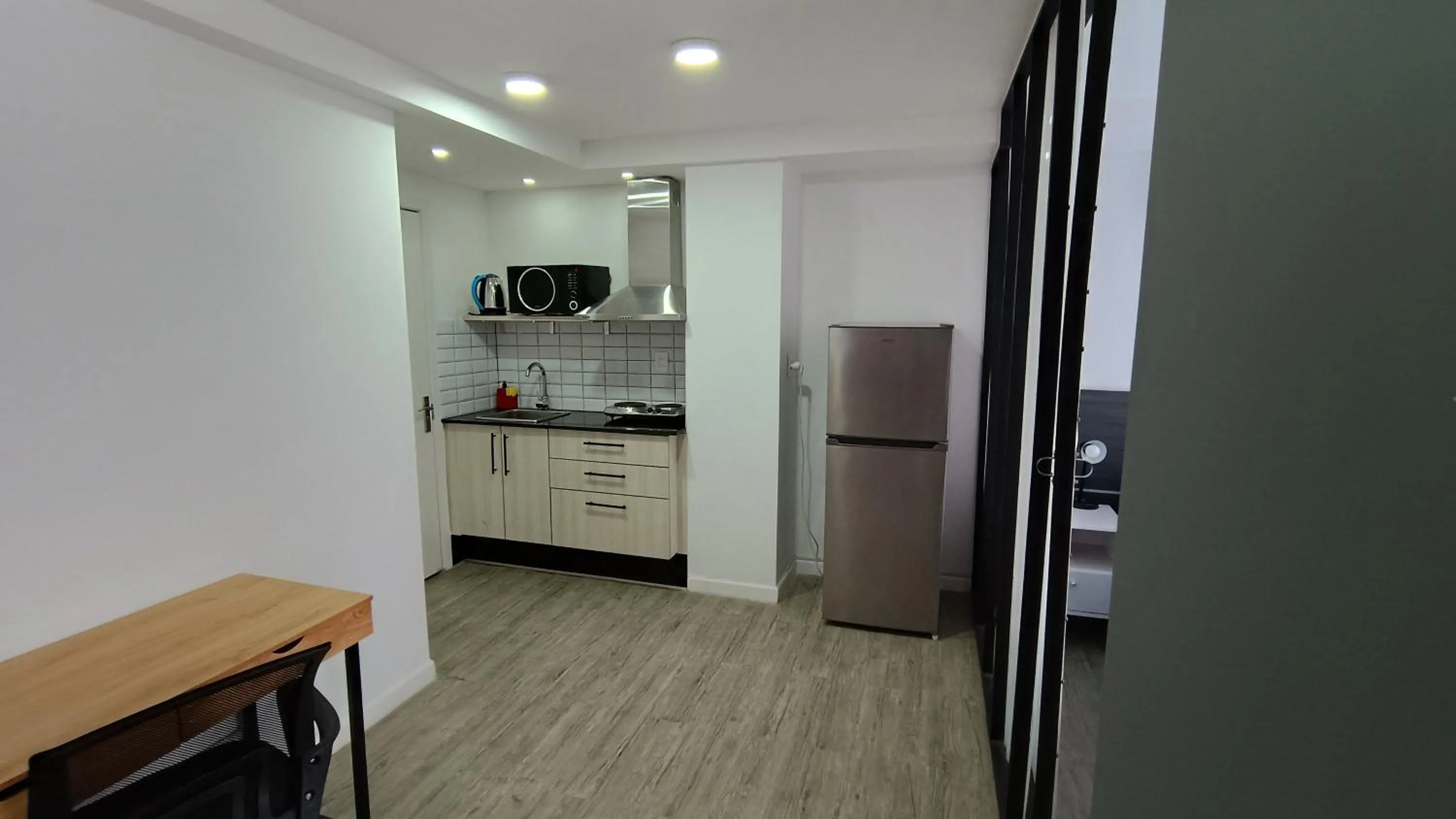 Kitchen or kitchenette in Quijano Hotel - Aparts & Suites