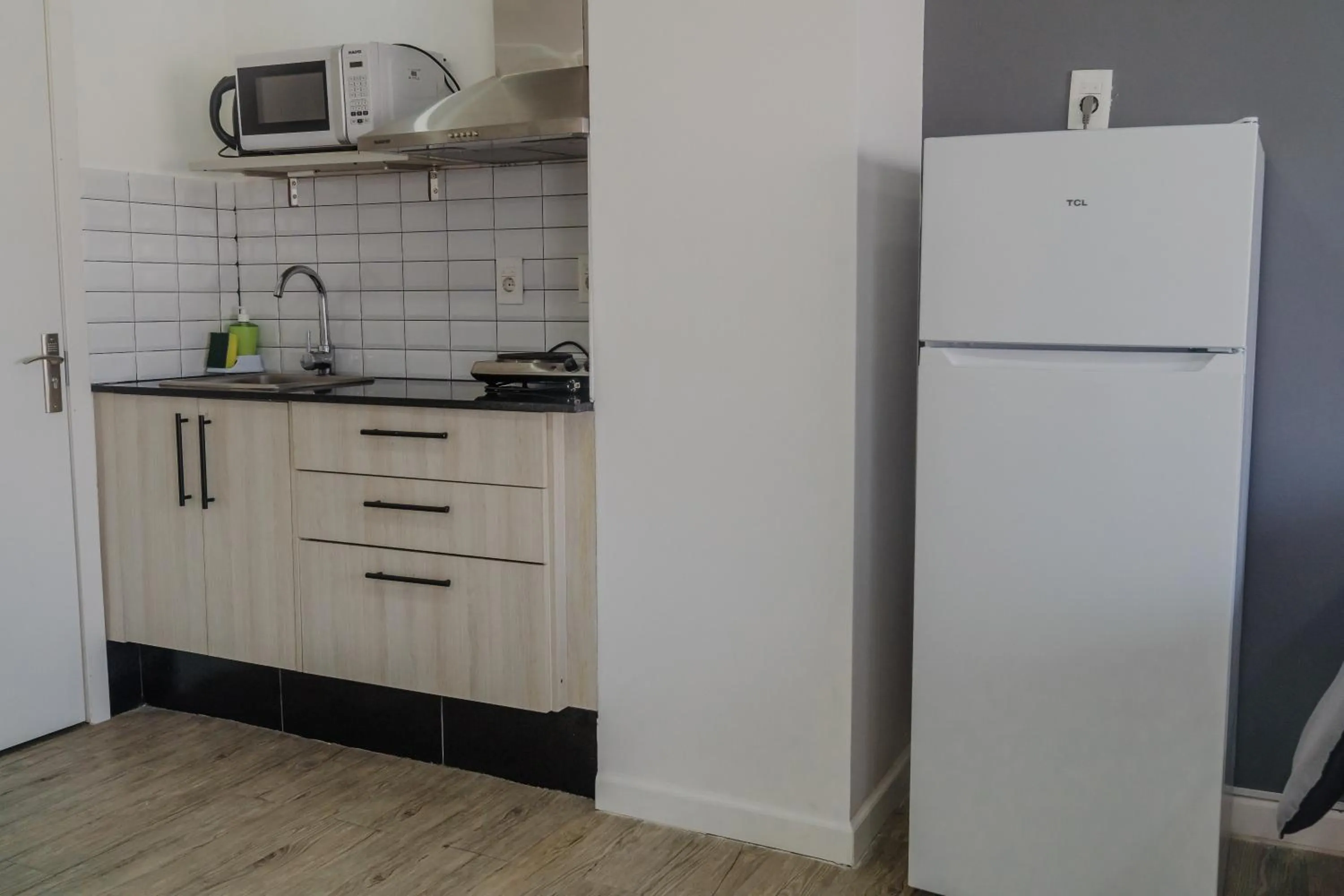 Kitchen or kitchenette in Quijano Hotel - Aparts & Suites