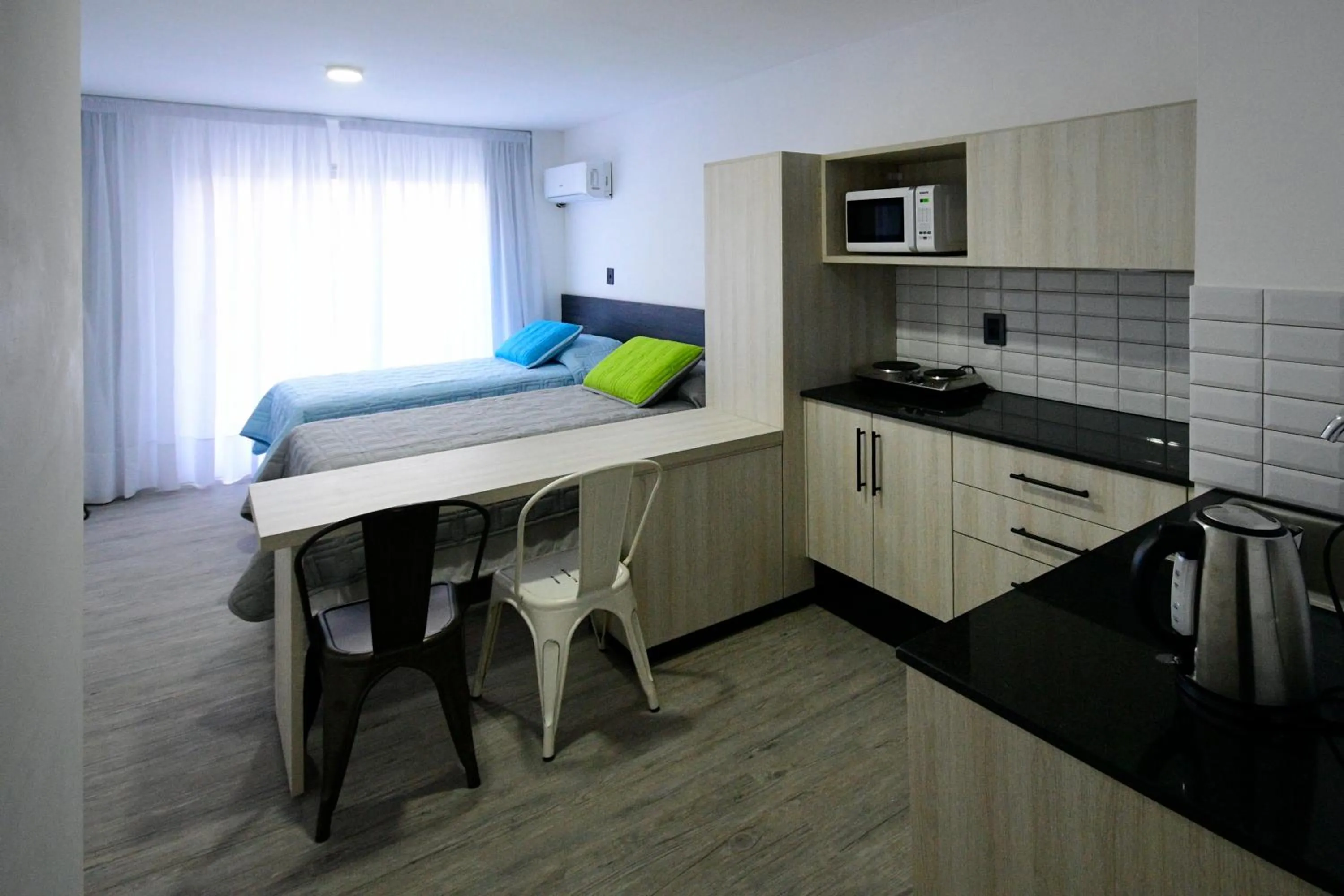 Kitchen or kitchenette in Quijano Hotel - Aparts & Suites
