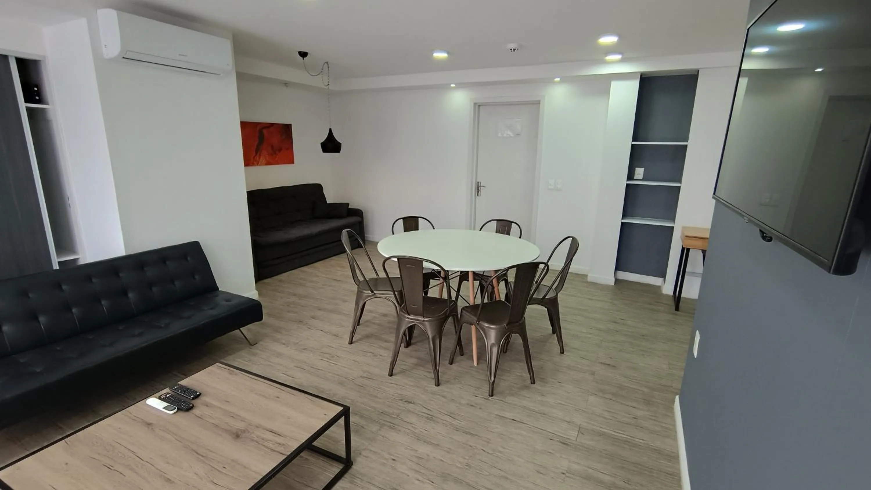 Communal lounge/ TV room in Quijano Hotel - Aparts & Suites