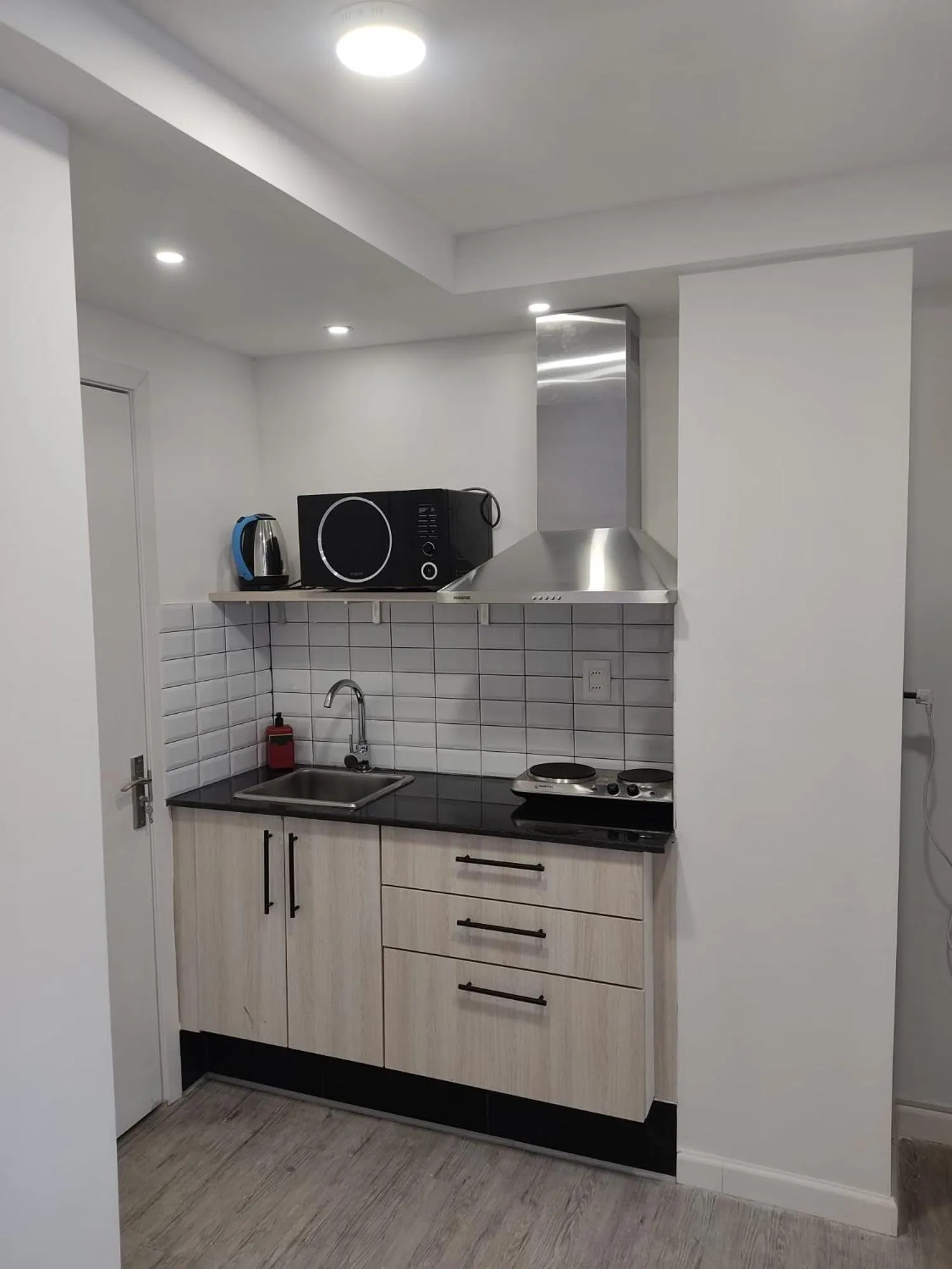 Kitchen or kitchenette in Quijano Hotel - Aparts & Suites